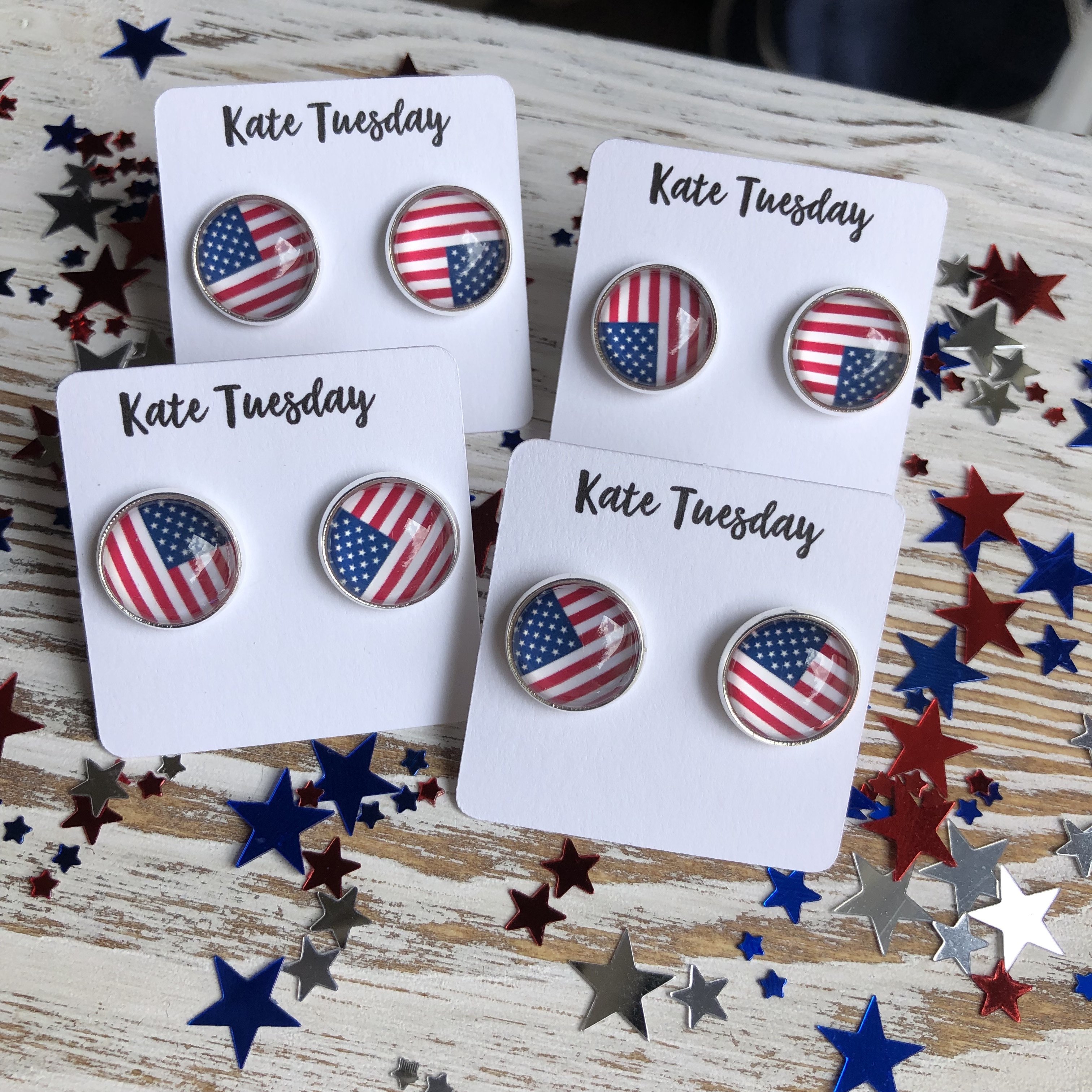 A pair of 12 mm American Flag Earrings with a silver setting, showcasing vibrant colors and a patriotic design.