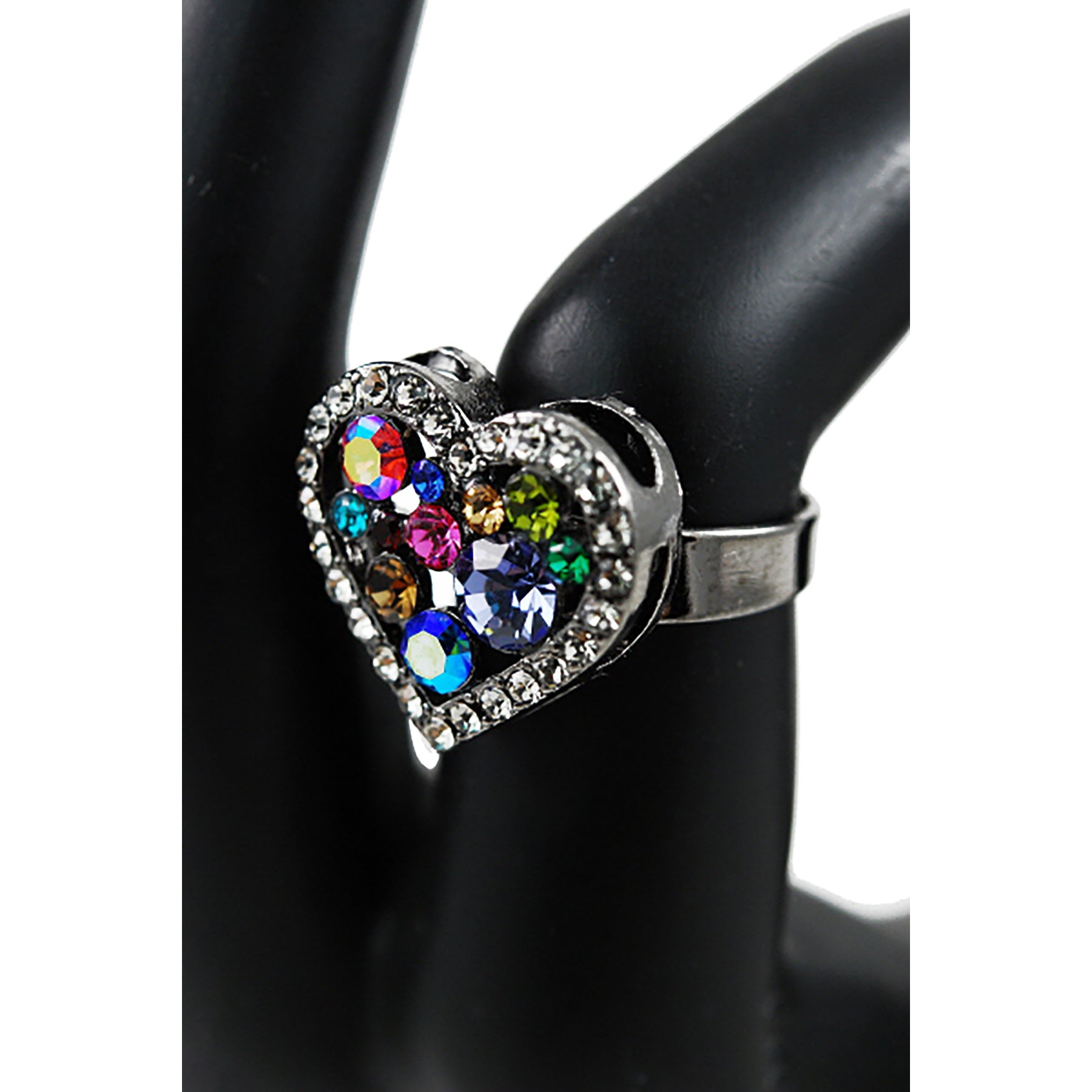 Heart-shaped ring with colorful gemstones.