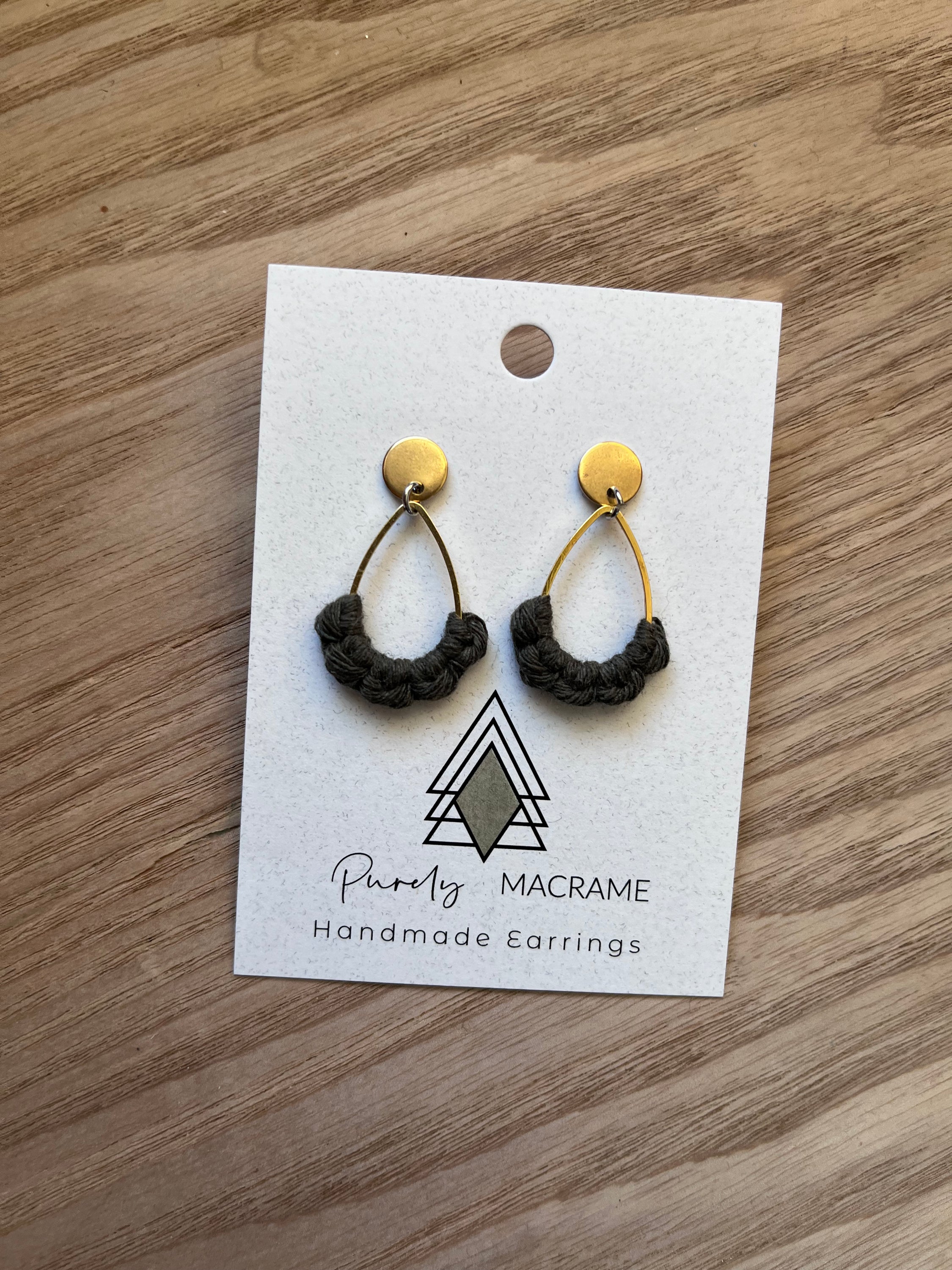 A pair of Autumn Olive Stud Teardrop earrings made from 100% cotton cord, featuring a lightweight and elegant design.