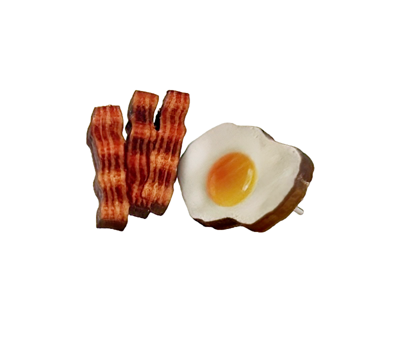 A pair of whimsical Bacon + Eggs Earrings made from sustainably sourced wood, featuring a laser-cut design with a natural wood back.