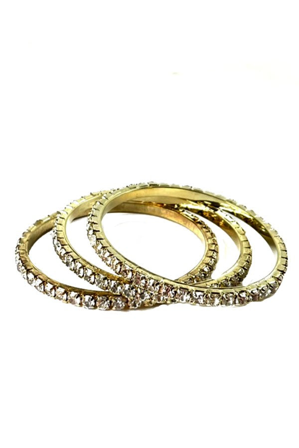 A beautiful set of three rhinestone bangles, showcasing sparkling embellishments and a comfortable fit.