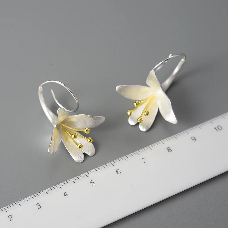 Elegant Bellflower Earrings made of 925 sterling silver with gold-plated stamens, showcasing intricate floral design.