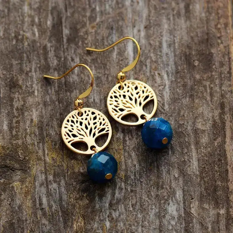 Handmade Blue Apatite Tree of Life Earrings featuring vibrant blue gemstones in a symbolic design.