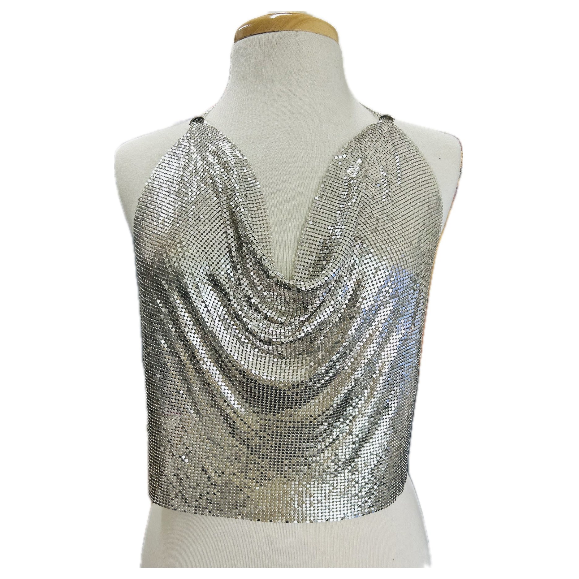 A stylish silver body chain designed for backless tops, featuring a mesh design and adjustable clasp.