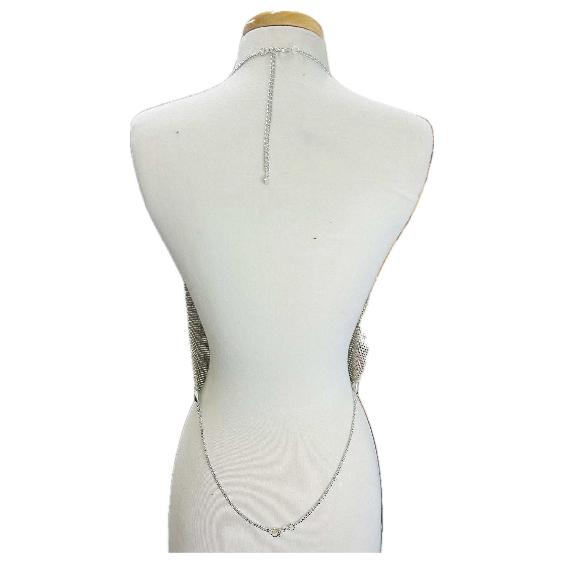 A stylish silver body chain designed for backless tops, featuring a mesh design and adjustable clasp.