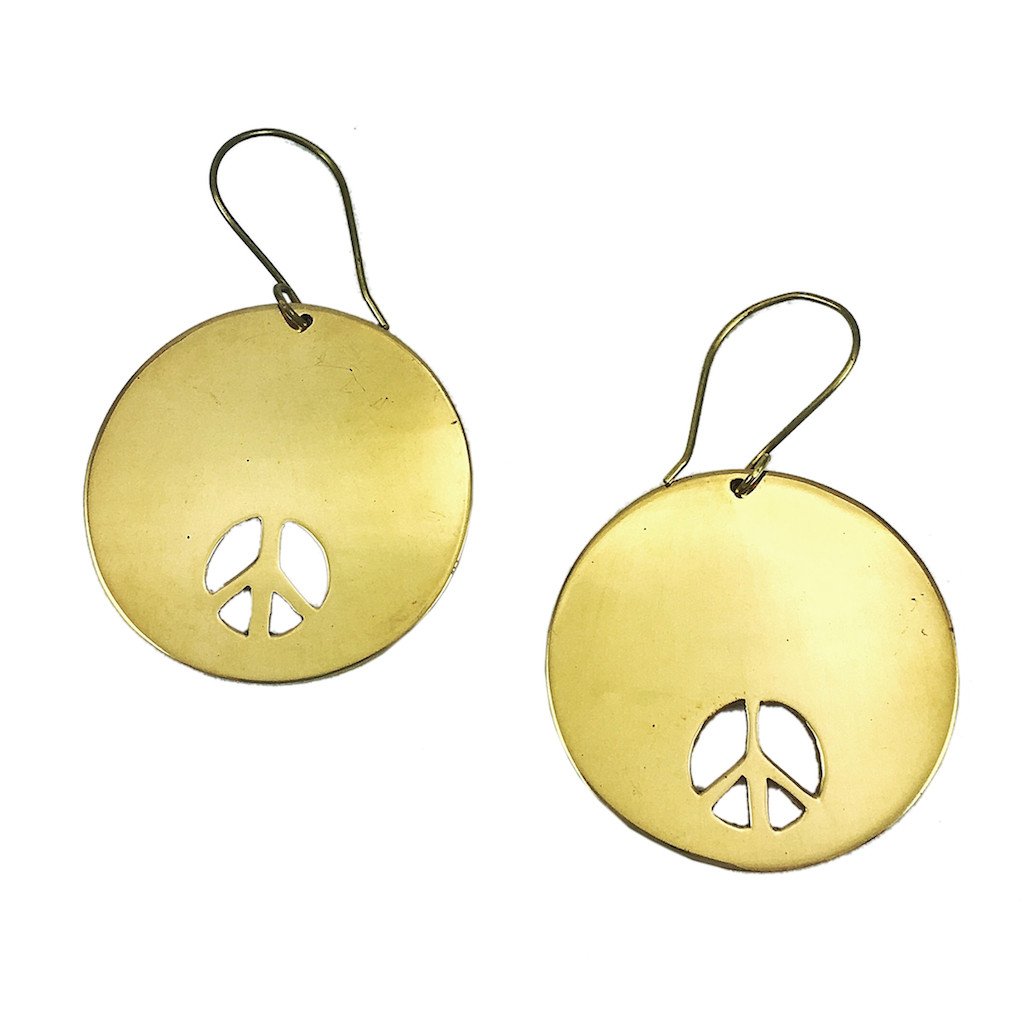 Bombshell Peace Earrings handcrafted from recycled brass, featuring a peace sign design, symbolizing transformation and support for Cambodian artisans.