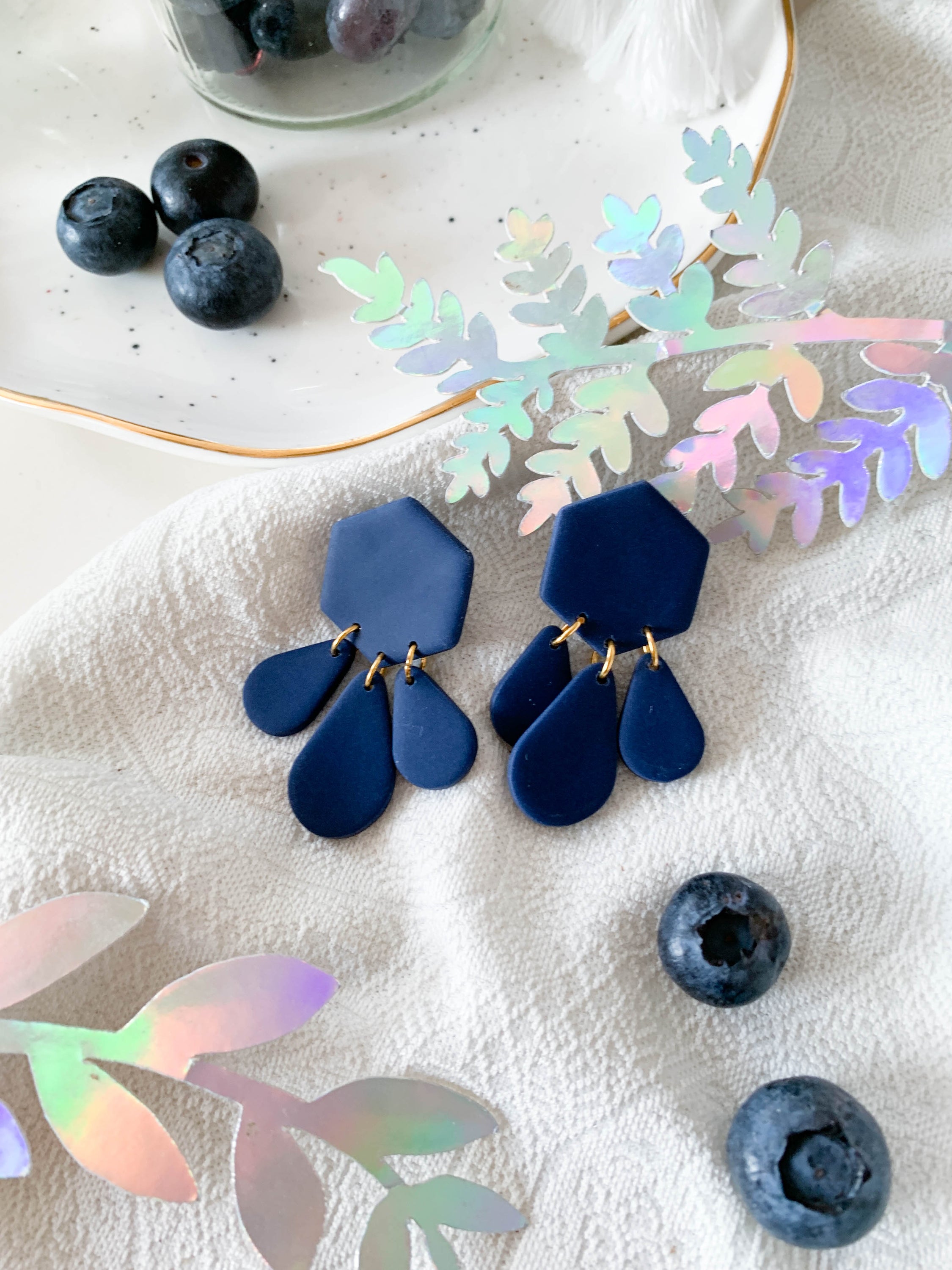 Bridget Blueberry dangle earrings featuring a modern hexagon teardrop design in vibrant blueberry color, perfect for stylish accessorizing.