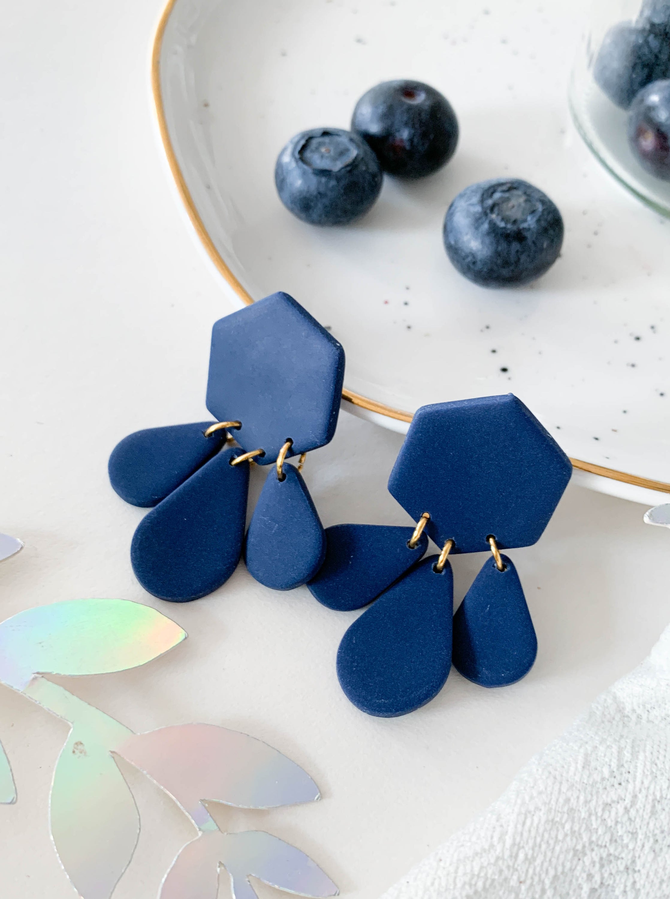 Bridget Blueberry dangle earrings featuring a modern hexagon teardrop design in vibrant blueberry color, perfect for stylish accessorizing.