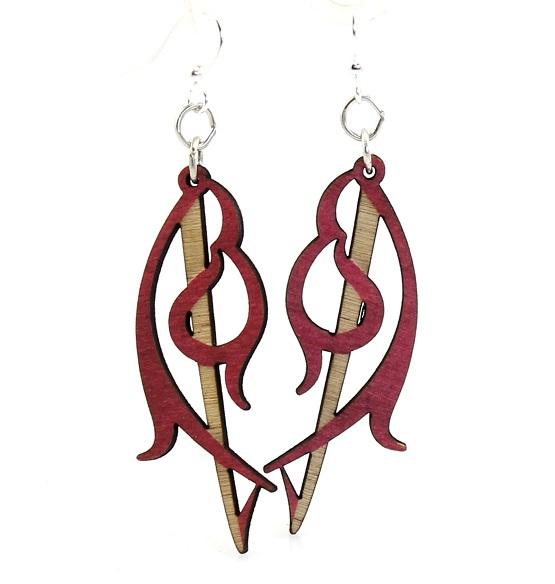 A pair of Buckler Earrings #1131 made from sustainably sourced wood, featuring a unique shield-inspired design in Cherry Red color.