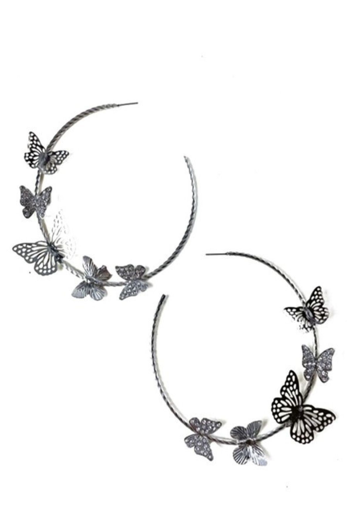 Elegant butterfly hoop earrings with a 3-inch diameter and latch back closure, showcasing intricate design and craftsmanship.