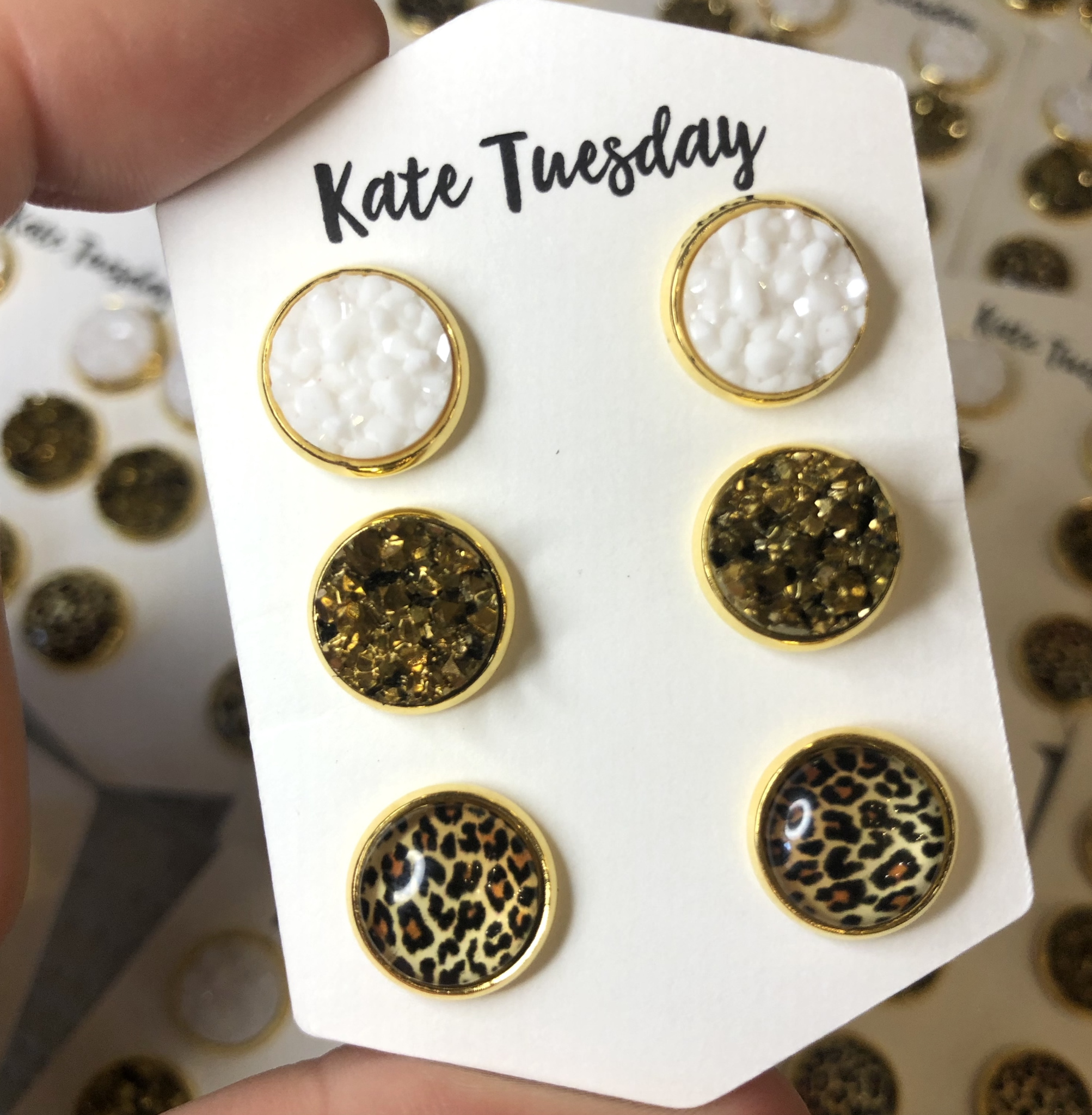 Cheetah White + Gold Druzy 10mm Earrings Triple Set displayed elegantly, showcasing their sparkling druzy stones and various metal settings.