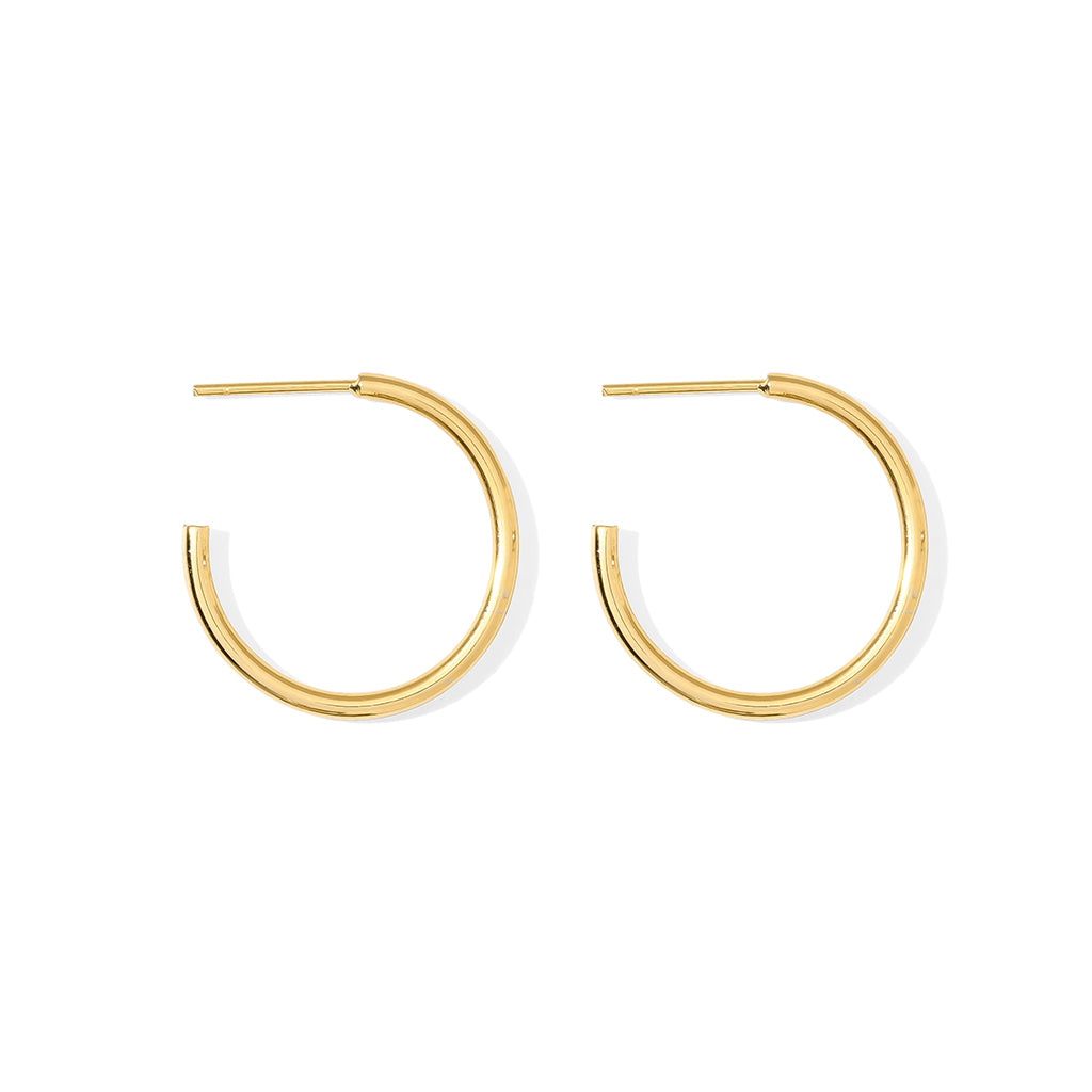 Classic Bombshell Hoop Earrings handcrafted from recycled materials with gold plating, showcasing elegance and sustainability.