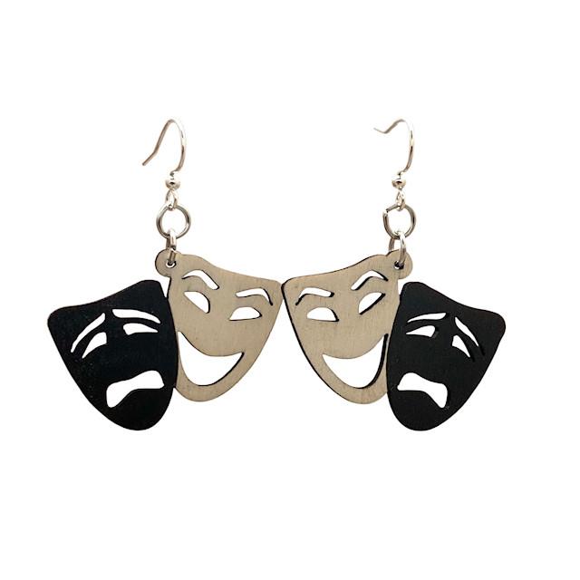 A pair of Comedy/Tragedy earrings featuring laser-cut wooden masks, one smiling and one frowning, with silver-finished stainless steel ear wires.