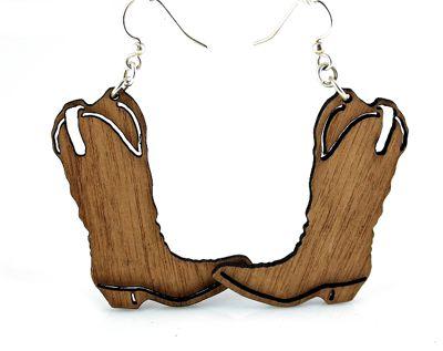 A pair of tan cowboy boot earrings made from sustainably sourced wood, showcasing intricate laser-cut details.