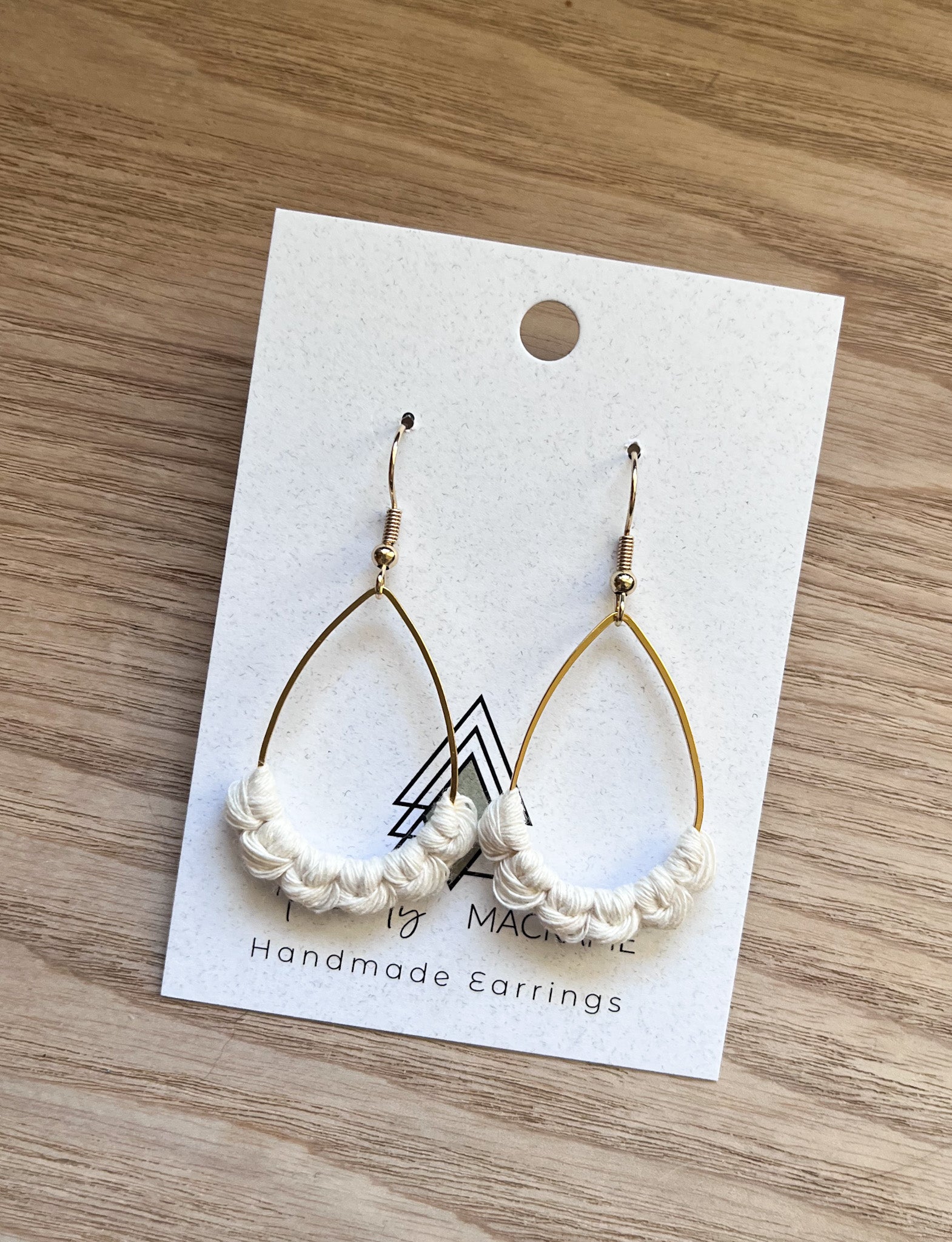 Elegant Cream Gold Teardrop earrings made from 100% macrame cotton, showcasing a lightweight and stylish design.