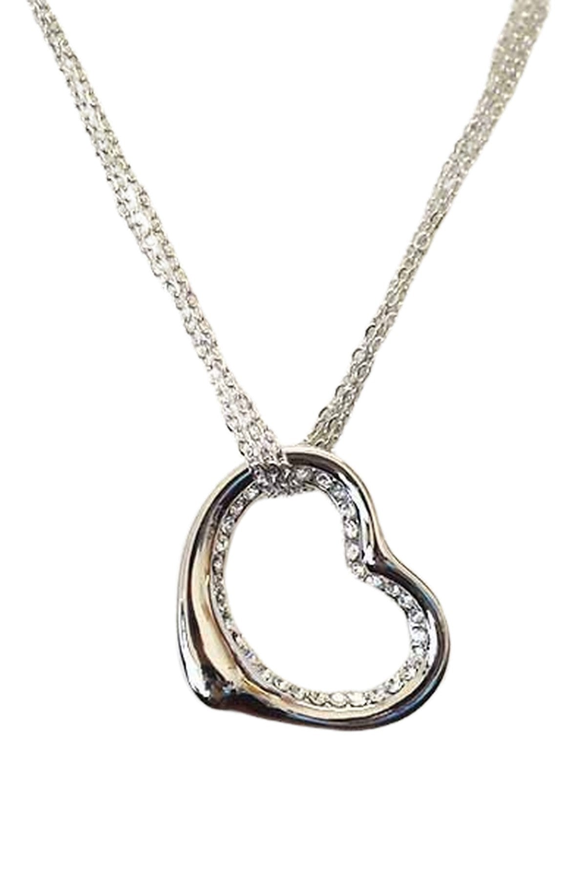 A stunning crystal cut out heart pendant necklace with a double plated finish and a 24-inch chain.