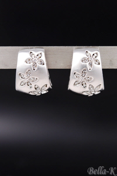 Elegant crystal flower earrings with a double plated finish, featuring a secure post back and a 1-inch drop length.