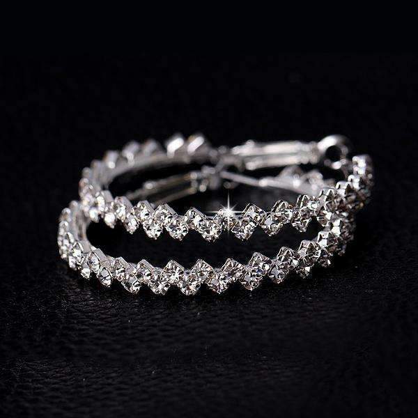 Elegant crystal hoop earrings featuring a zig-zag design made with Austrian crystals and high-quality zinc alloy.