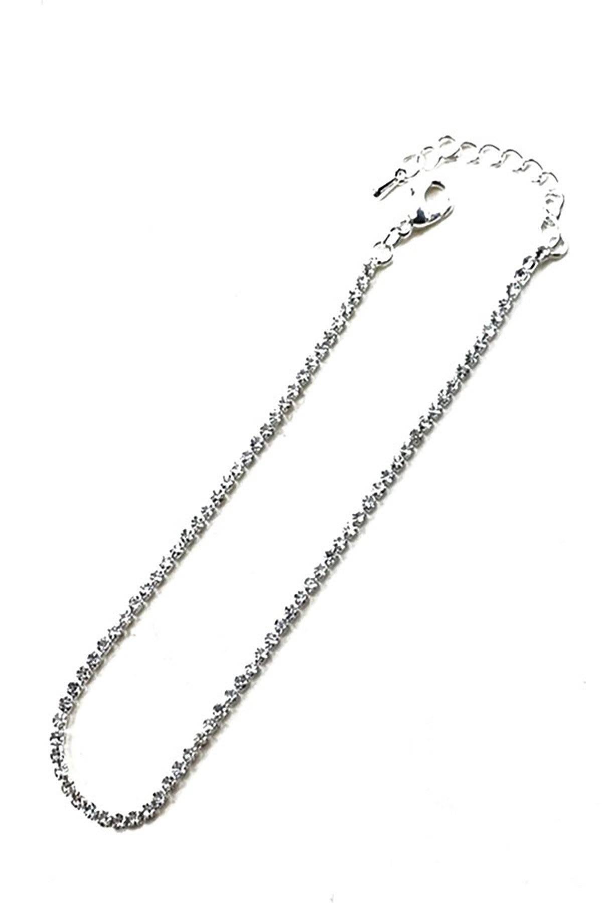 Crystal Lined 1 Row Anklet with lobster claw clasp and extender, showcasing elegant design and sparkling crystals.