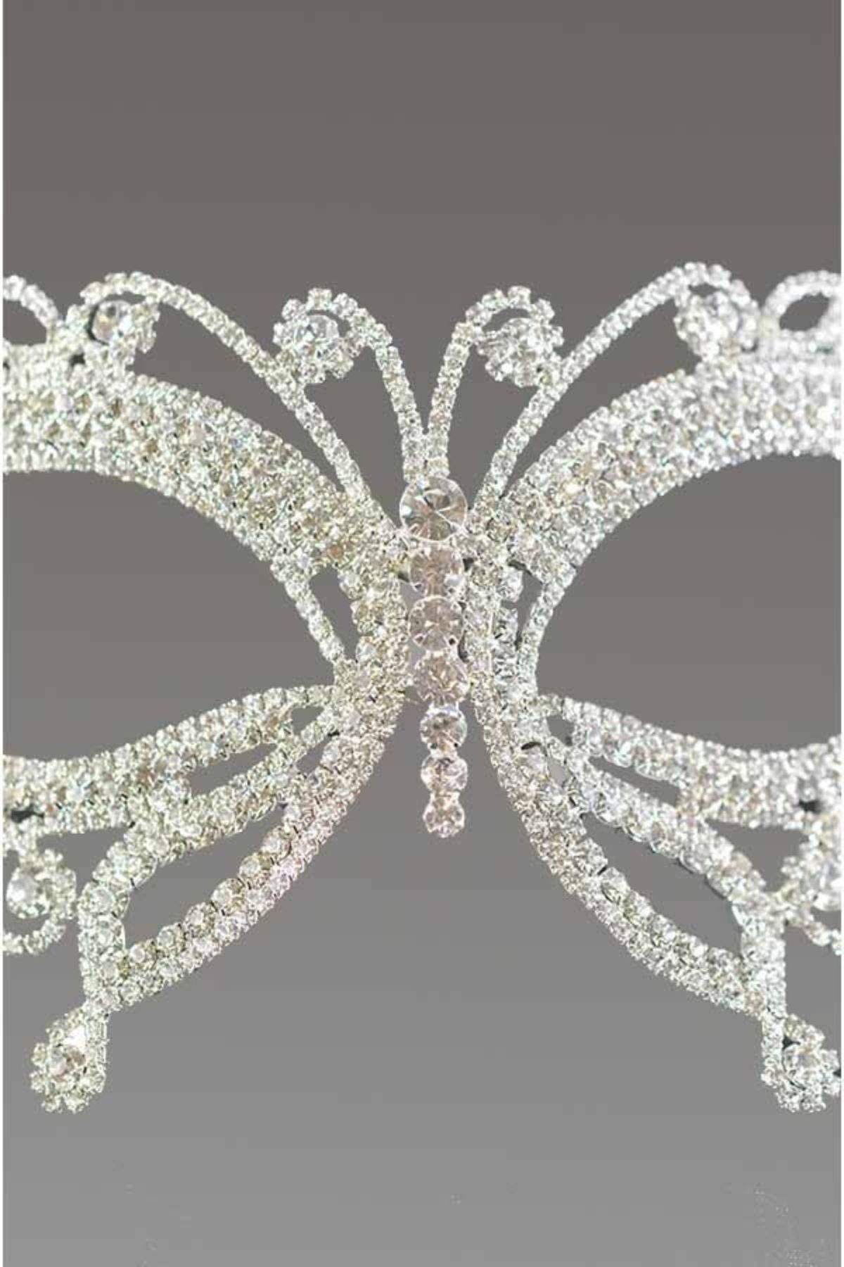 Elegant Crystal Butterfly Masquerade Mask with black ribbon ties, showcasing intricate design.