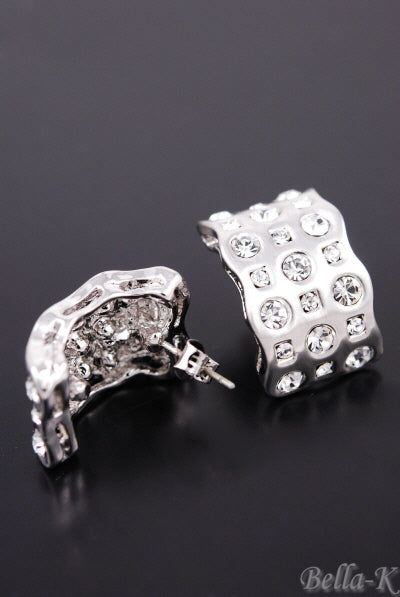 Elegant crystal studded earrings with a double plated design and post back closure, showcasing a 1-inch drop size.