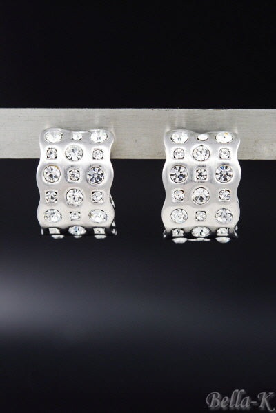 Elegant crystal studded earrings with a double plated design and post back closure, showcasing a 1-inch drop size.