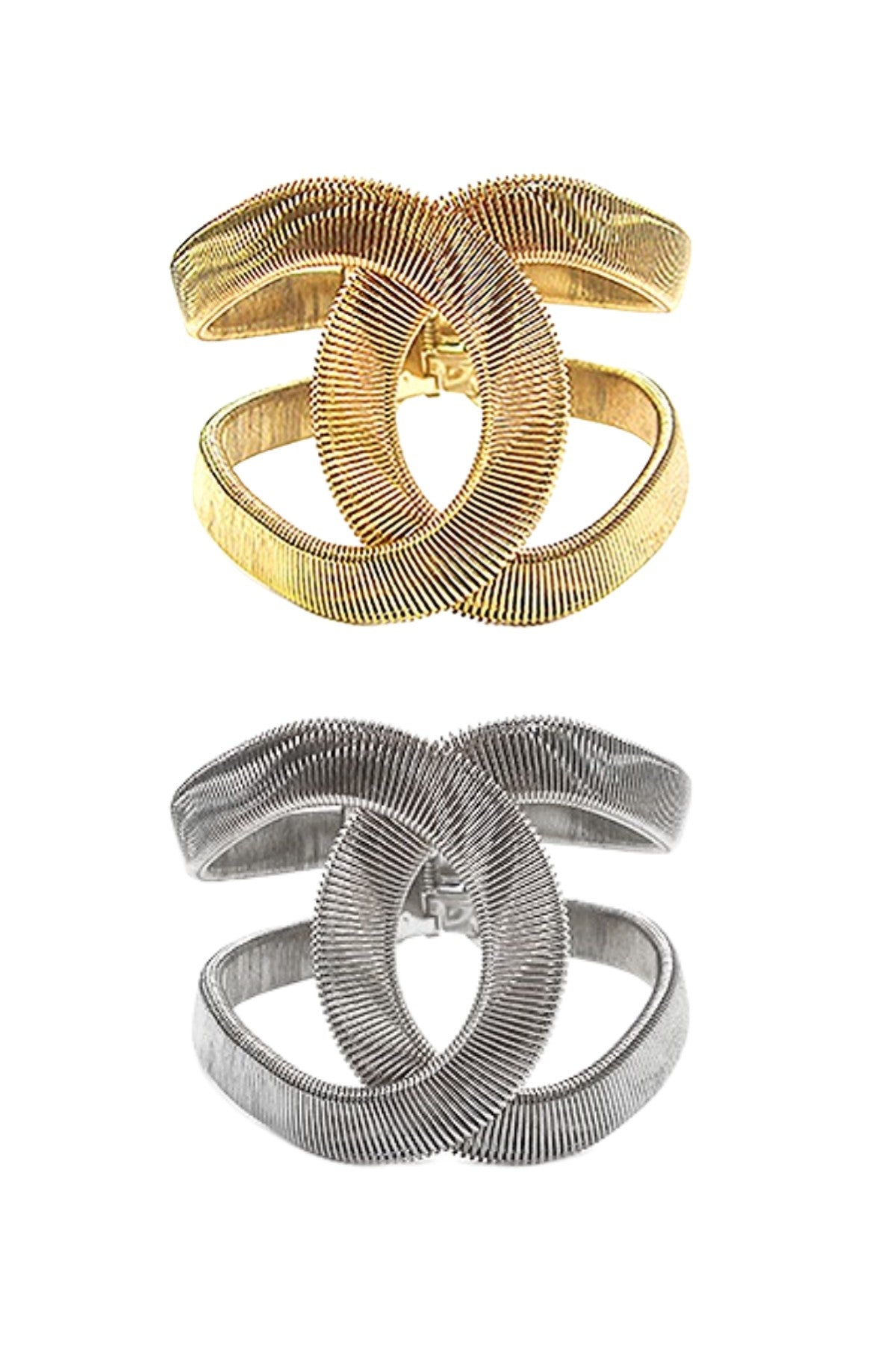 A stylish cuff wrap metal bracelet featuring a spring snap closure, designed for elegance and comfort.