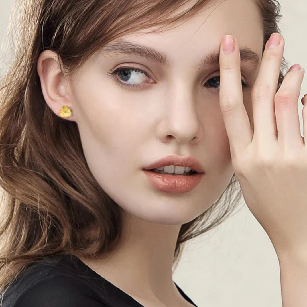 Dainty Blooms stud earrings featuring floral design in sterling silver with warm 18K gold plating, perfect for everyday elegance.