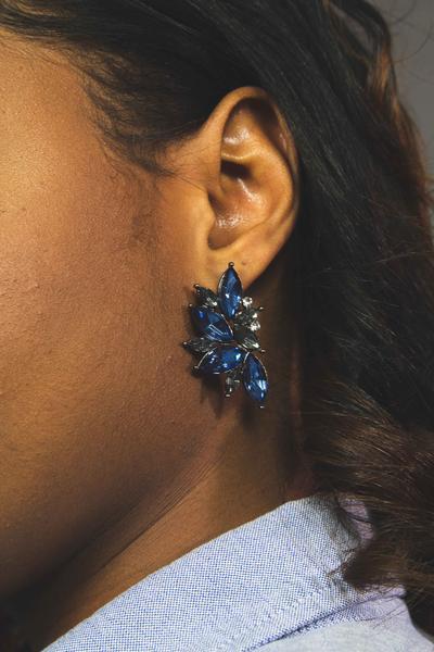 Dangle - Blue Angel earrings featuring a geometric design in gold with crystallized stones, perfect for special occasions.