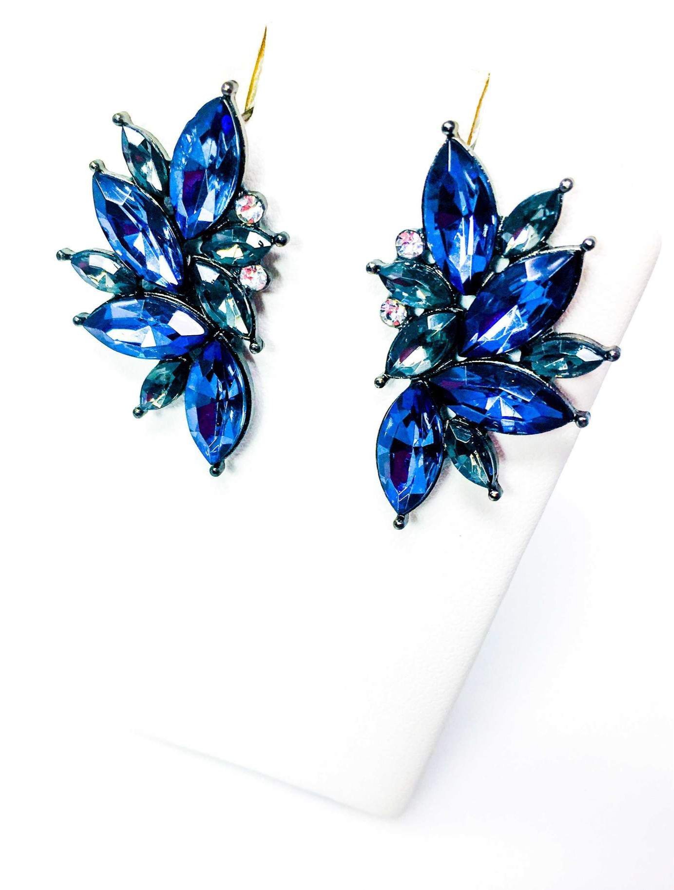 Dangle - Blue Angel earrings featuring a geometric design in gold with crystallized stones, perfect for special occasions.