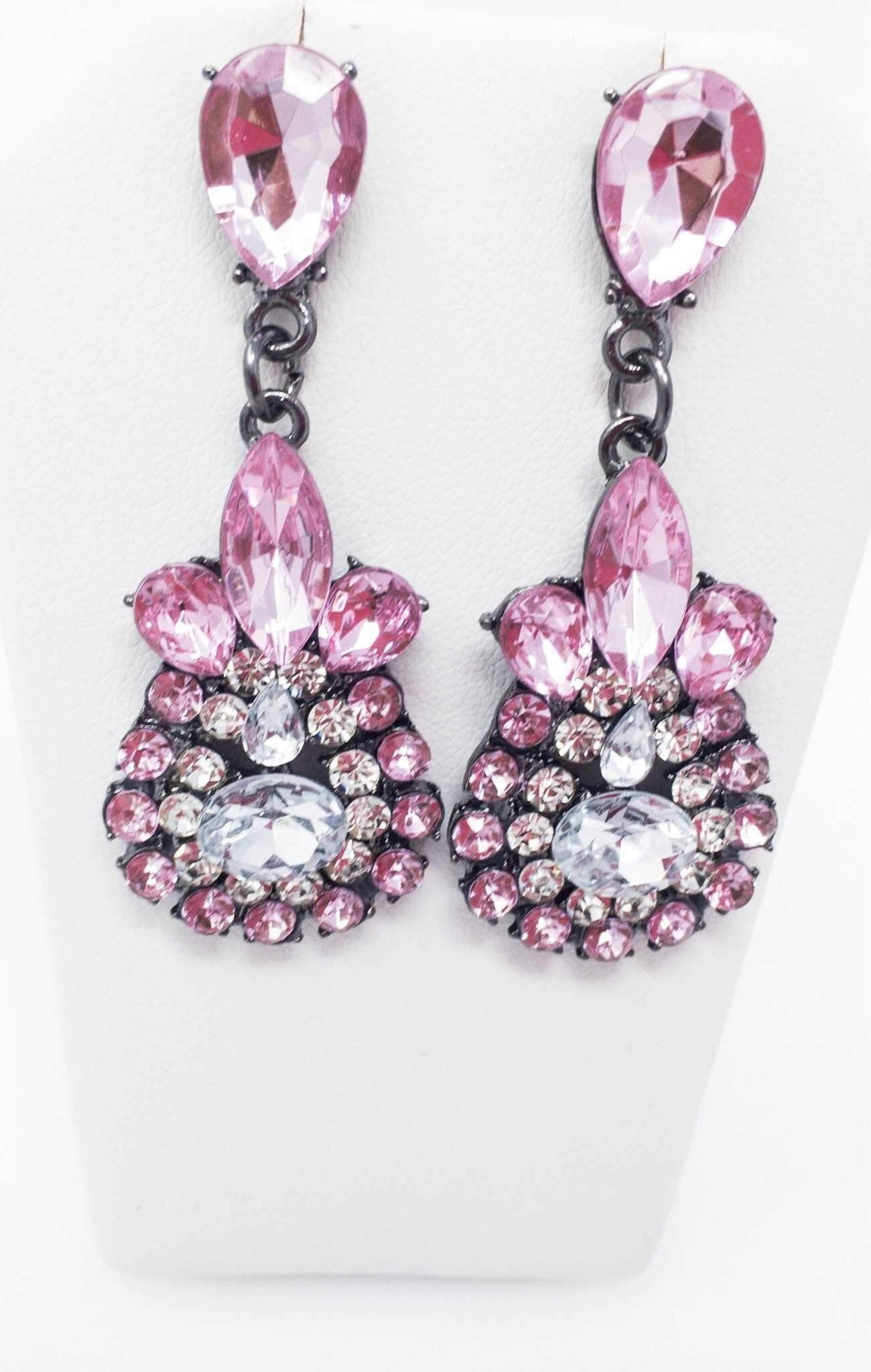 Dangle - Charisma Earrings featuring sparkling rhinestones in a teardrop design, available in pink and blue colors.