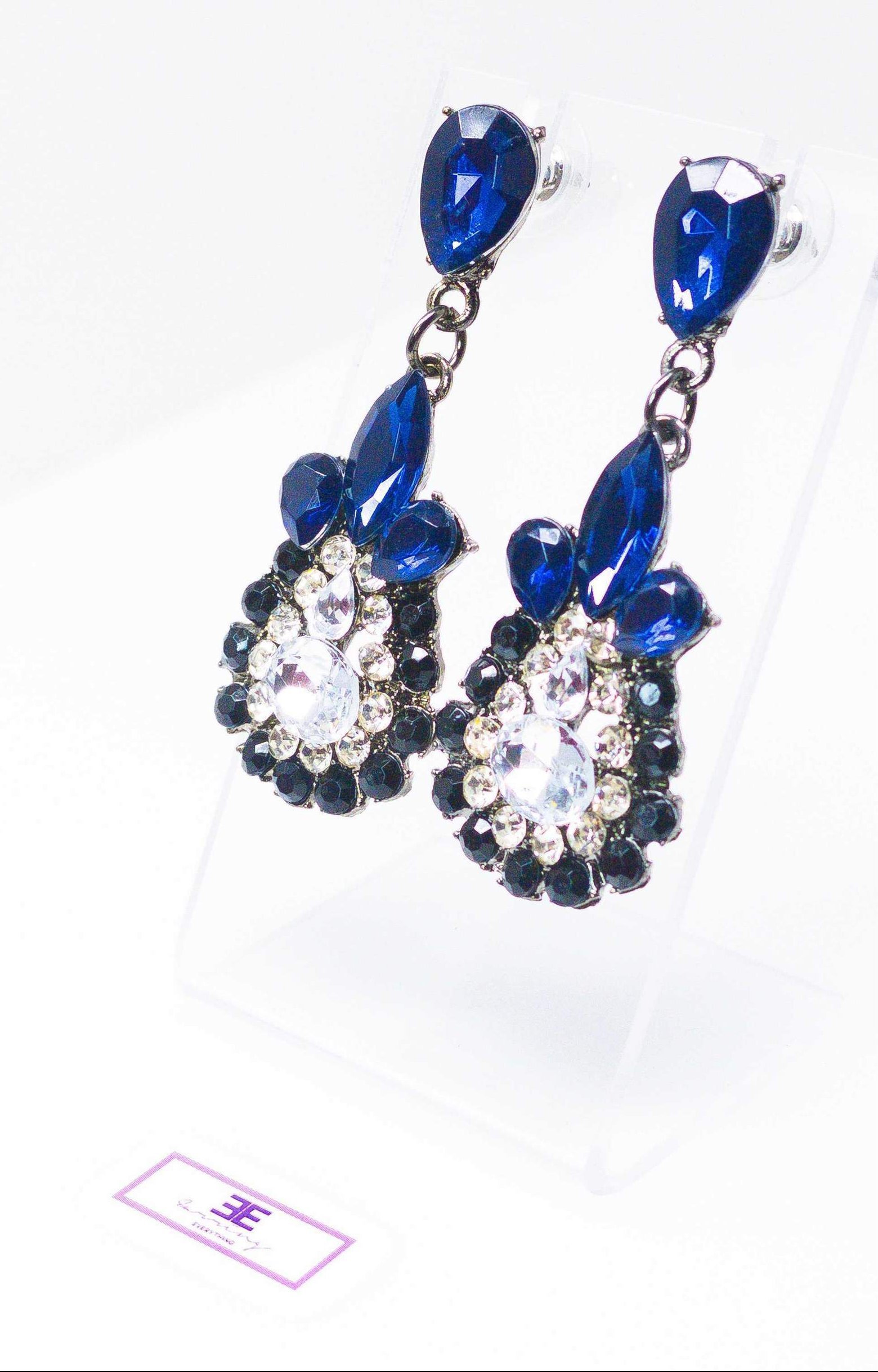 Dangle - Charisma Earrings featuring sparkling rhinestones in a teardrop design, available in pink and blue colors.