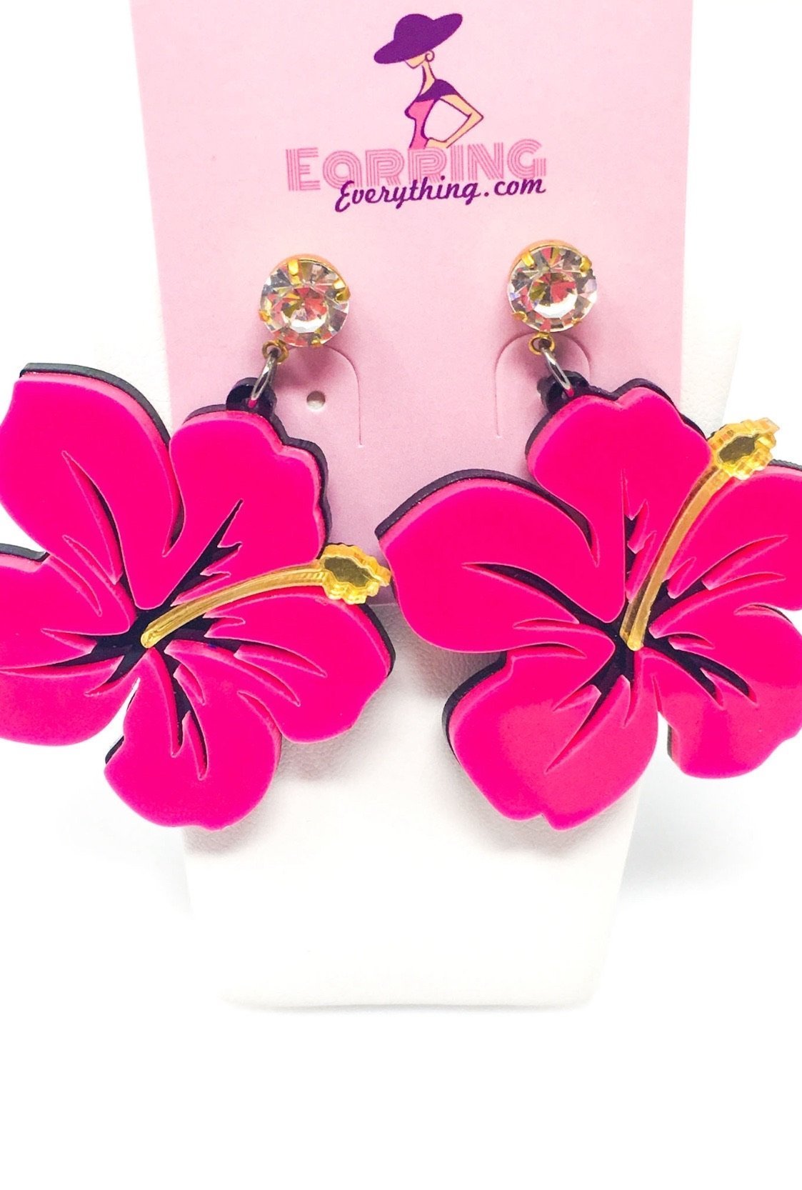 Dangle Hawaiian Hibiscus earrings featuring pink and blue acrylic sparkle drop design in a geometric heart shape.