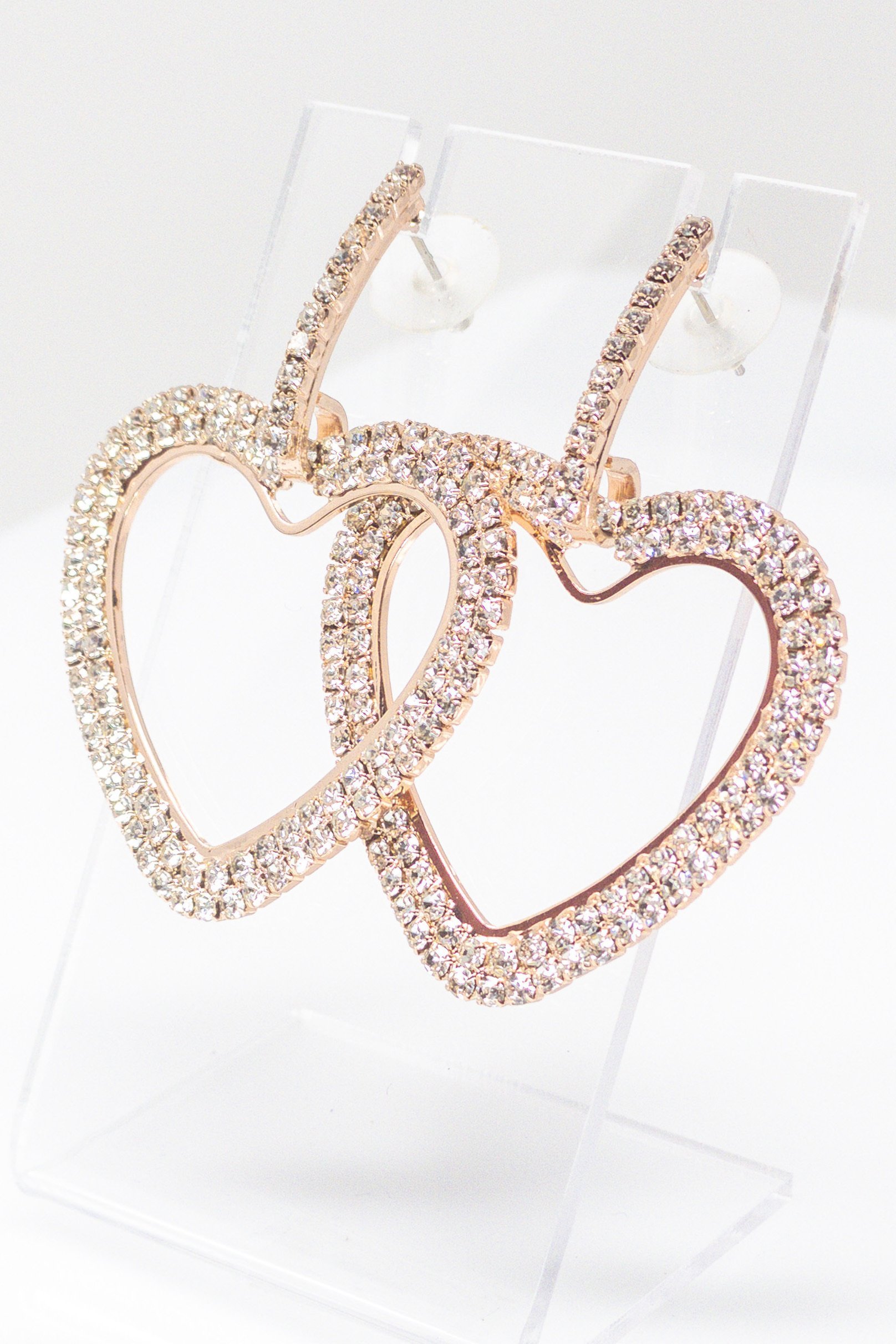 Dangle - Kitty Love earrings showcasing sparkling geometric designs in gold, rose gold, silver, and black colors.