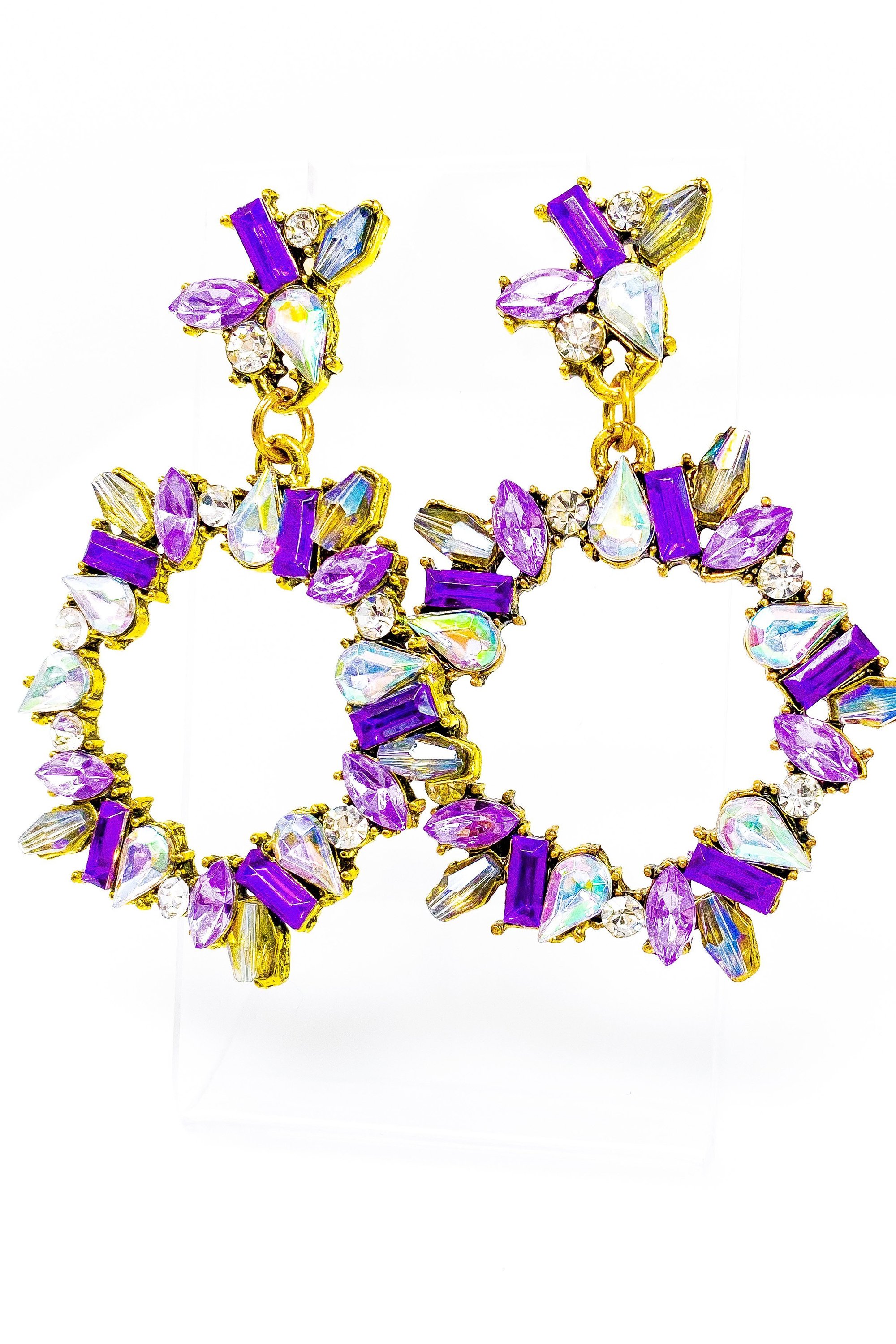 Dangle - Purple Starling earrings featuring crystallized stone drops in gold and purple colors, showcasing a geometric circle design.