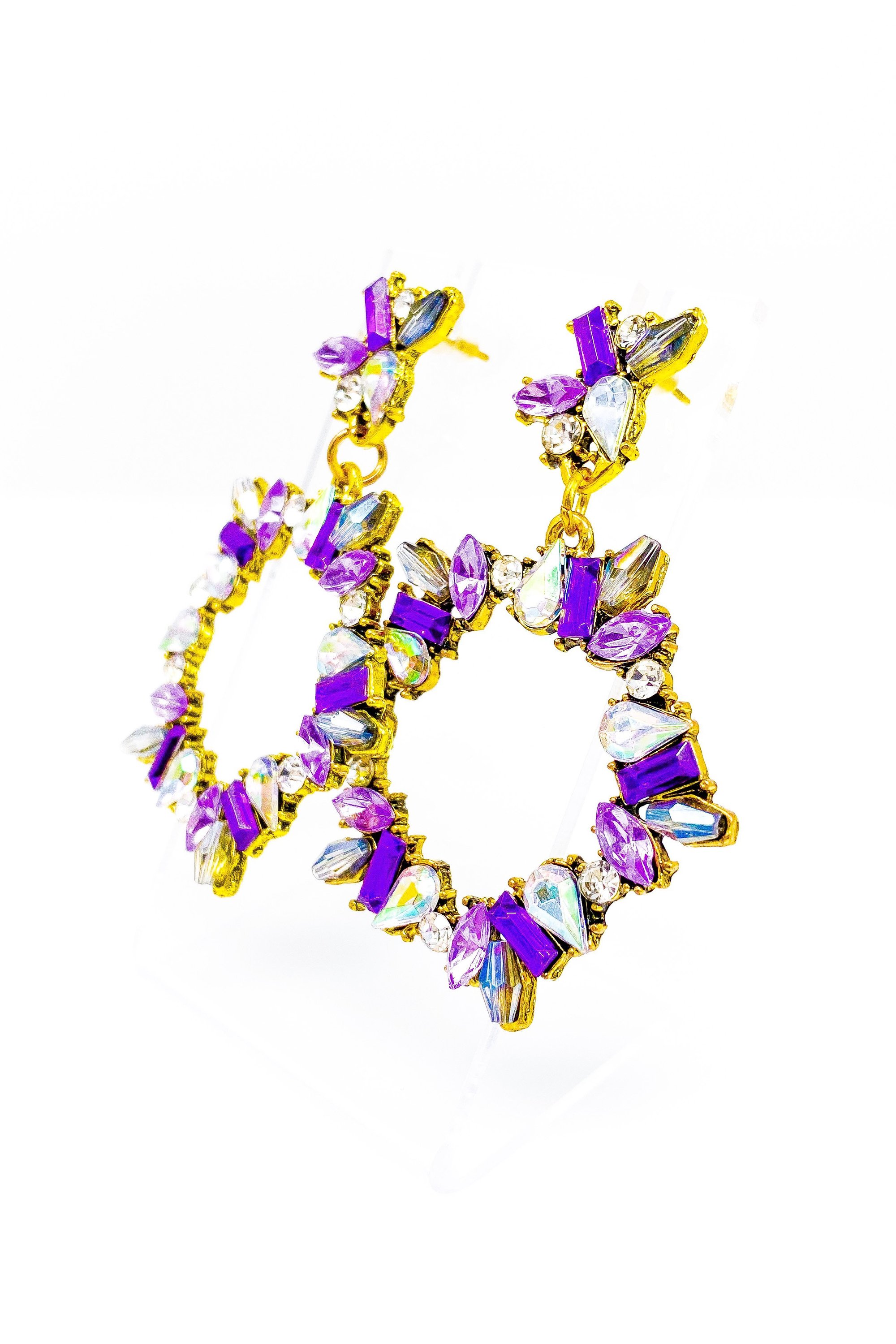 Dangle - Purple Starling earrings featuring crystallized stone drops in gold and purple colors, showcasing a geometric circle design.