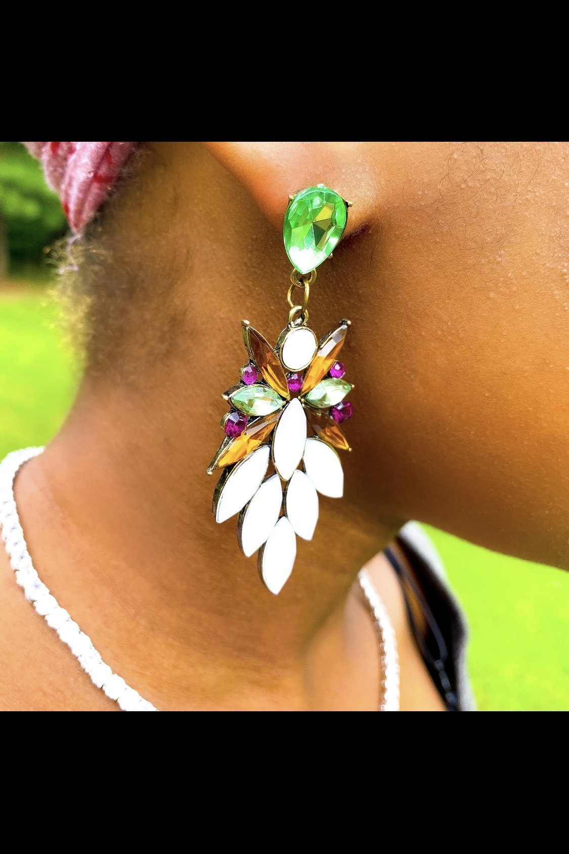 Dangle - Royale Earrings featuring crystallized stone drops in a geometric design, available in silver, green, tan, and purple.