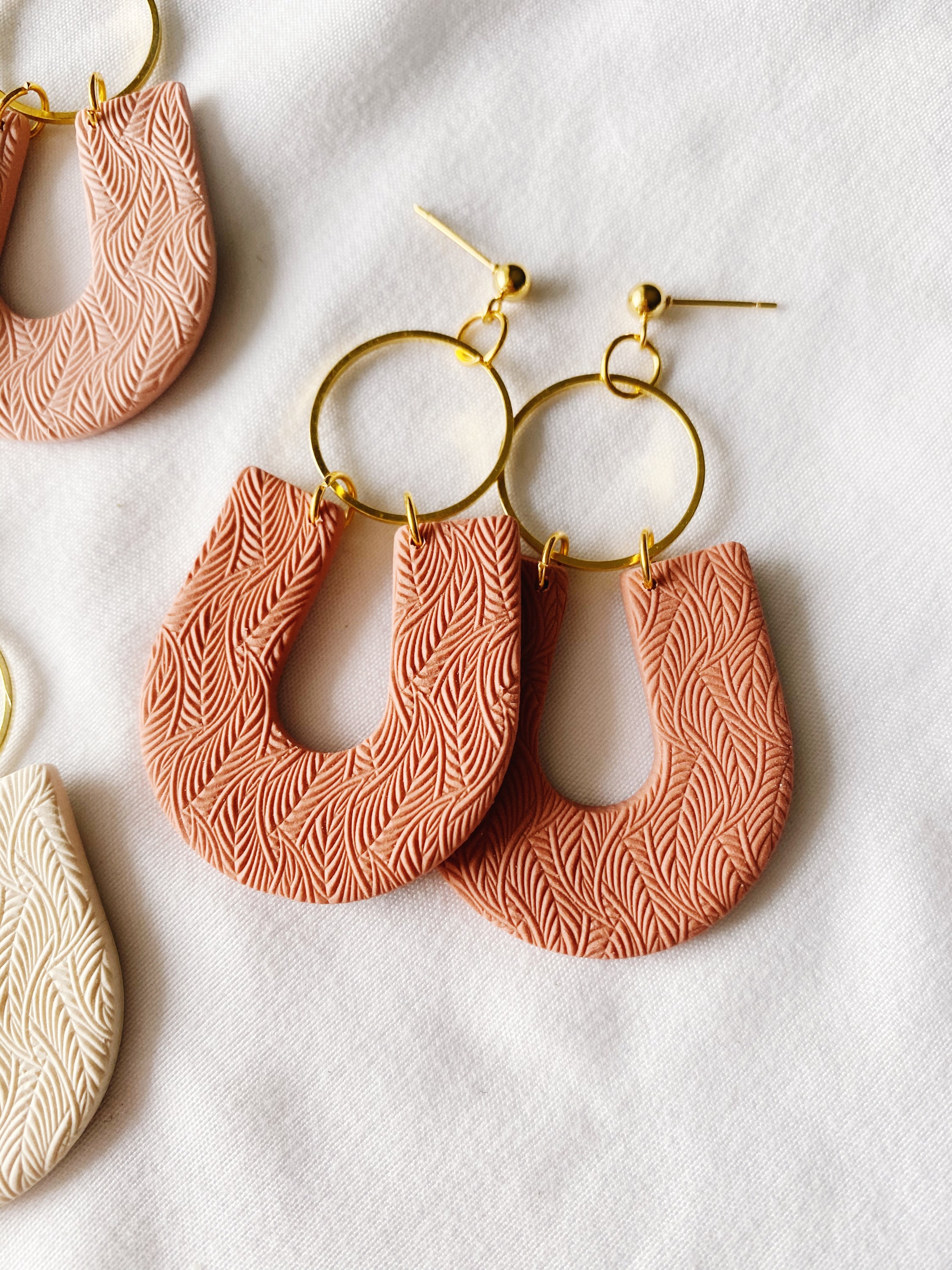 Delilah Handmade Polymer Clay Earrings featuring a minimalist design, lightweight and hypoallergenic, handcrafted in Winnipeg, Canada.