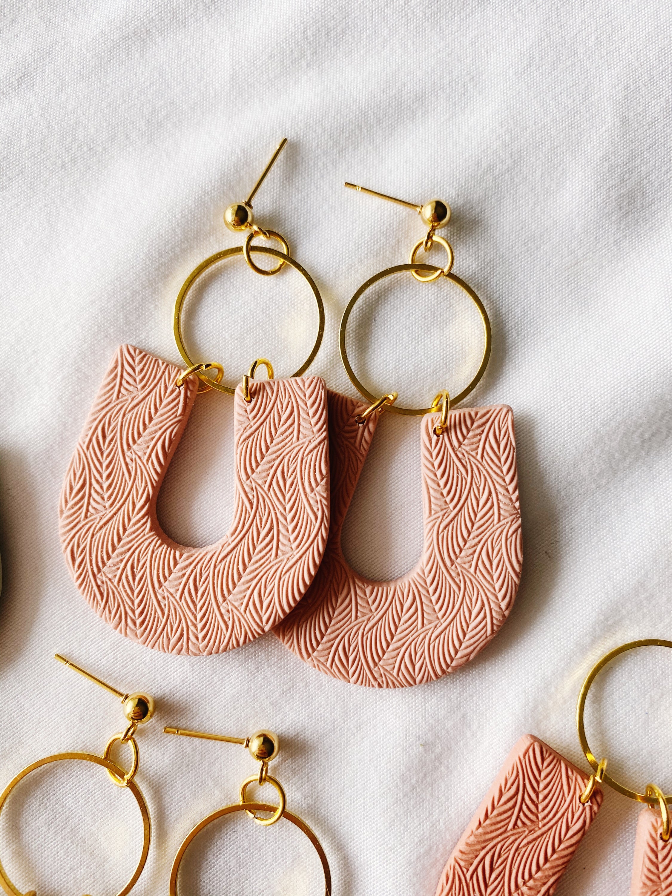 Delilah Handmade Polymer Clay Earrings featuring a minimalist design, lightweight and hypoallergenic, handcrafted in Winnipeg, Canada.