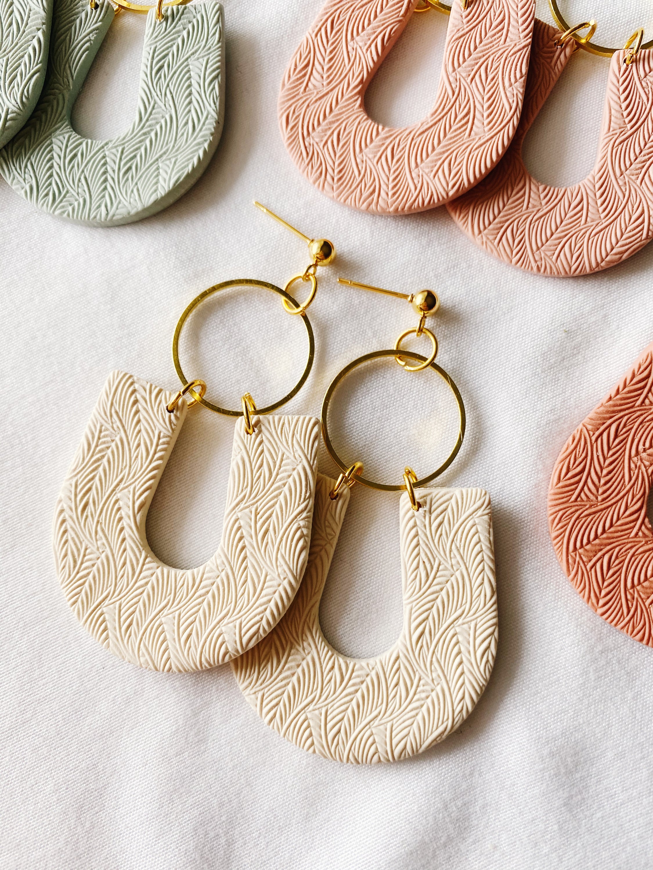 Delilah Handmade Polymer Clay Earrings featuring a minimalist design, lightweight and hypoallergenic, handcrafted in Winnipeg, Canada.