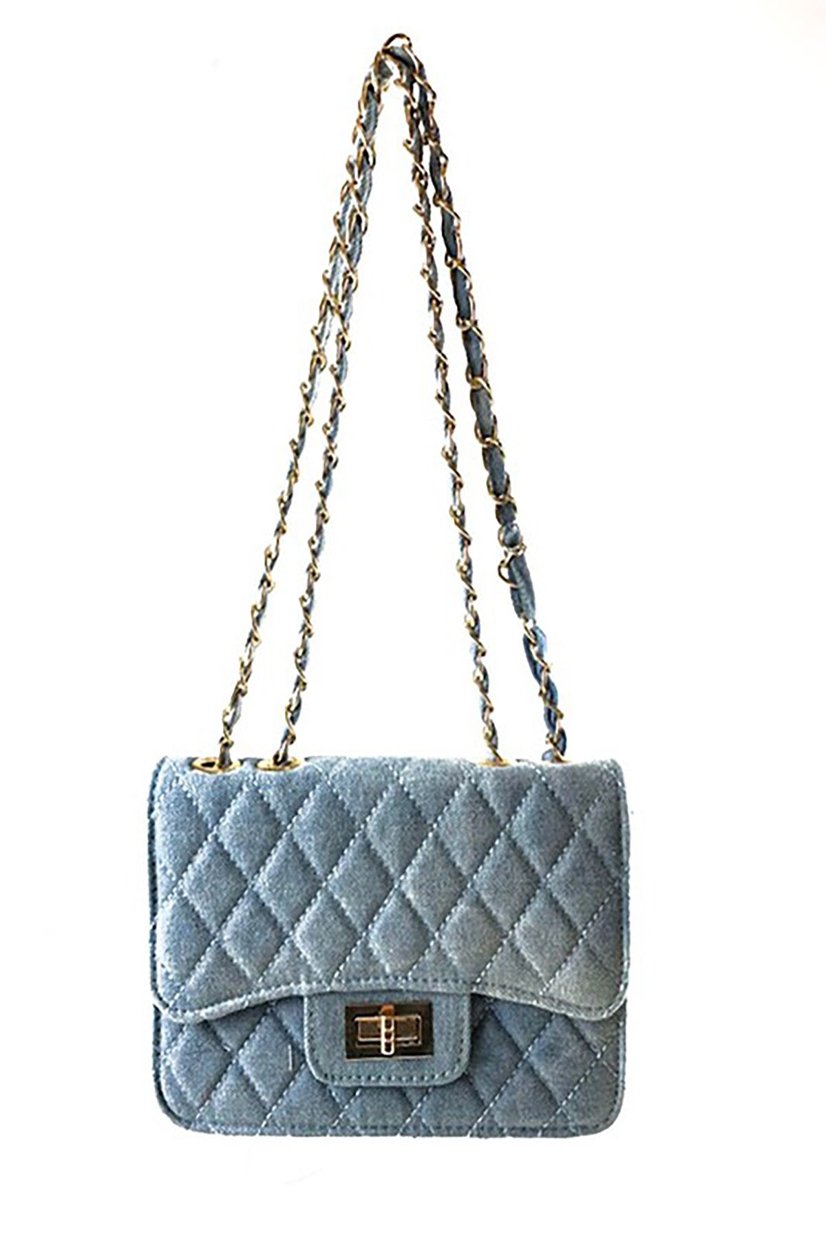 Stylish denim handbag with a flap and turn-lock closure, made from durable patent denim fabric.