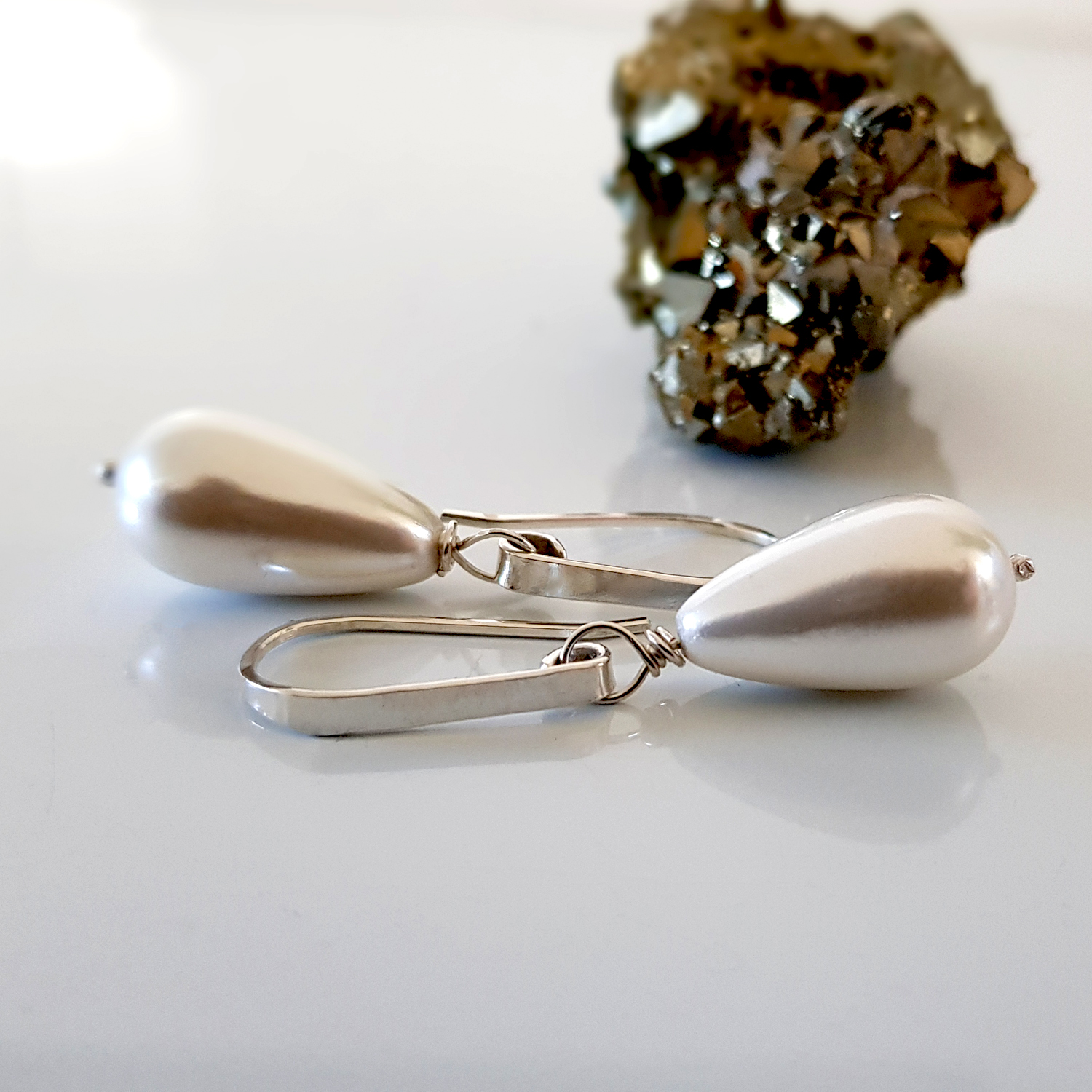 Dew Drop Teardrop Shell Pearl Earrings featuring Solid Silver 925 ear wires, showcasing elegant teardrop shell pearls in a handmade design.