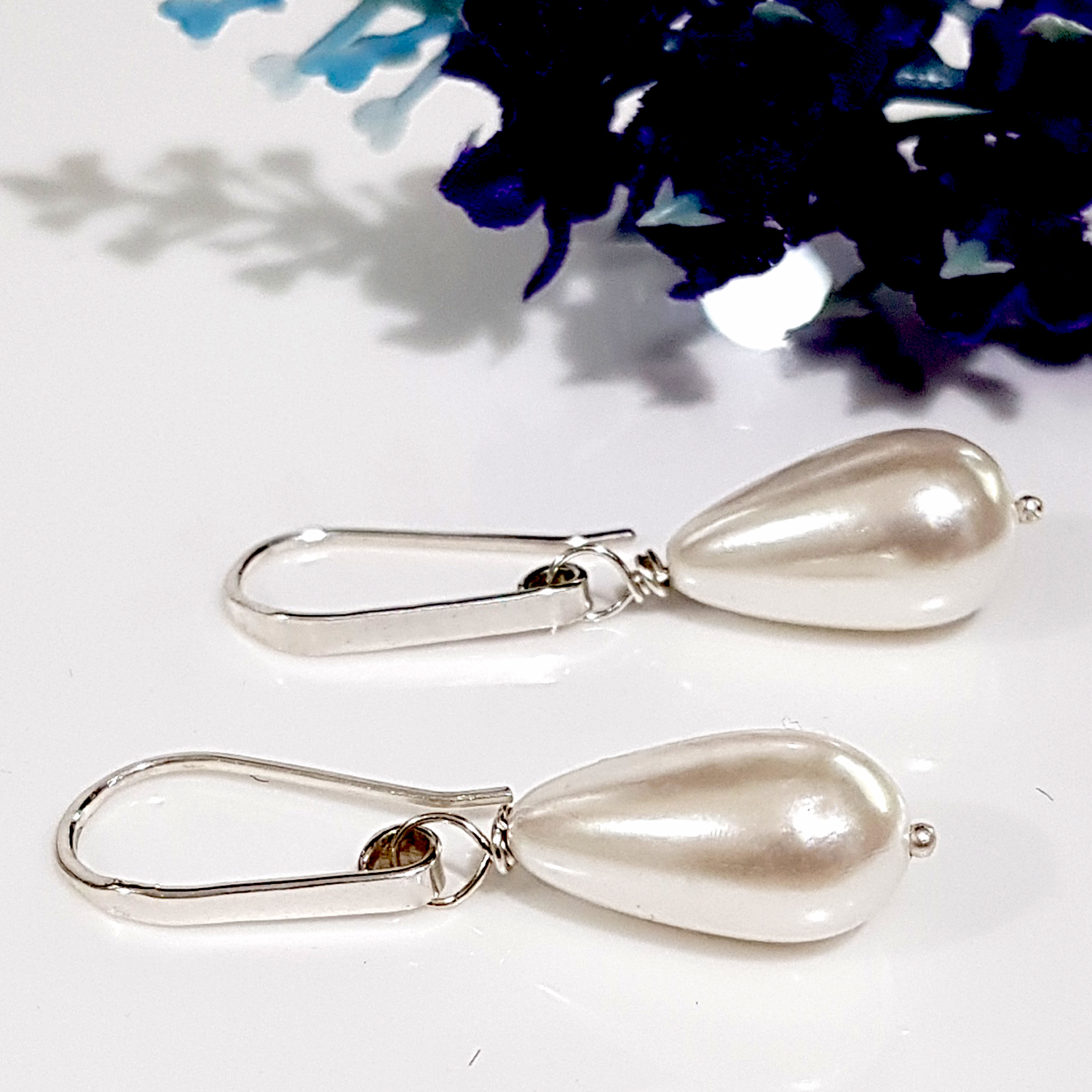 Dew Drop Teardrop Shell Pearl Earrings featuring Solid Silver 925 ear wires, showcasing elegant teardrop shell pearls in a handmade design.