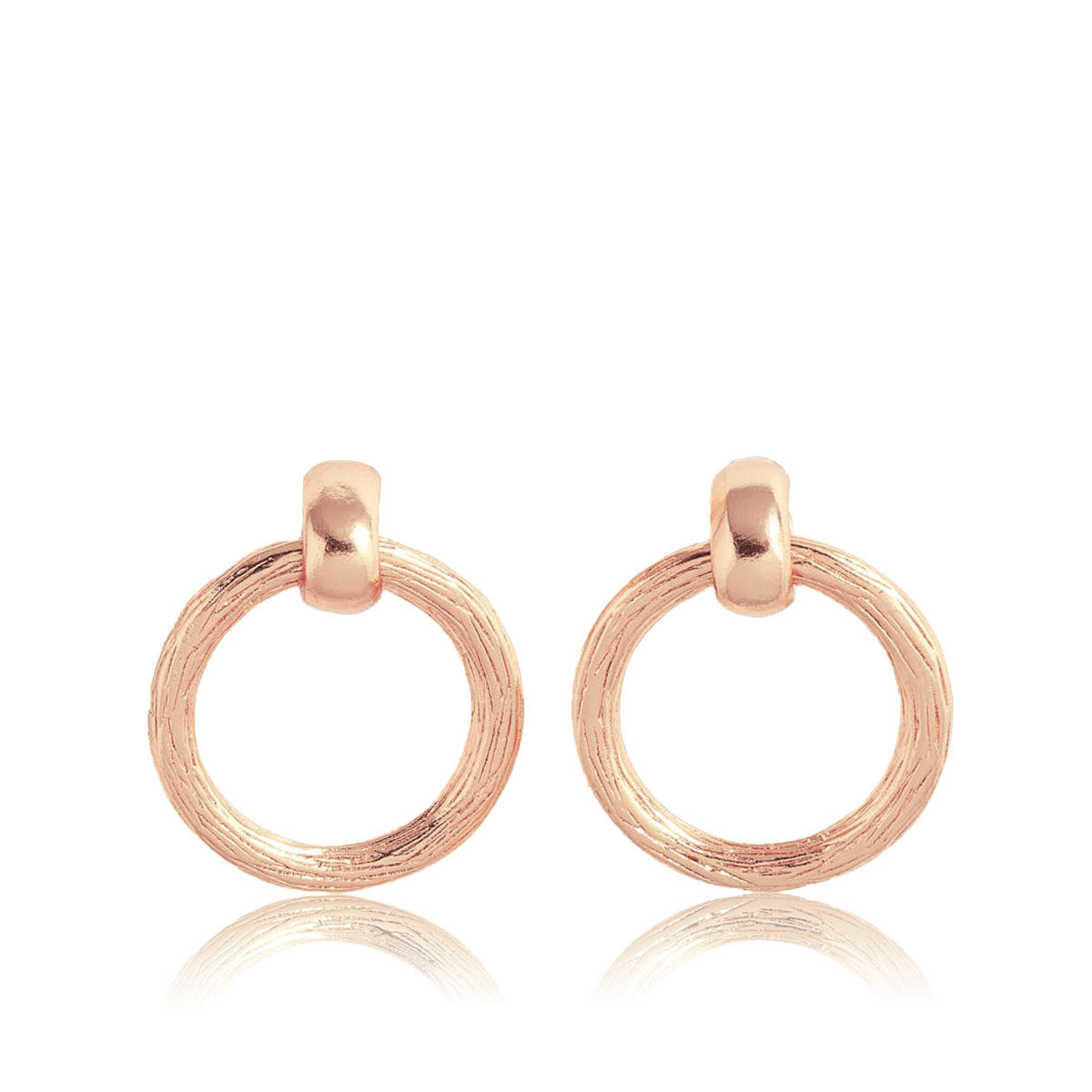 Elegant door knocker earrings in brushed finish, showcasing their stylish hoop design and available in gold, silver, and rose gold plating.