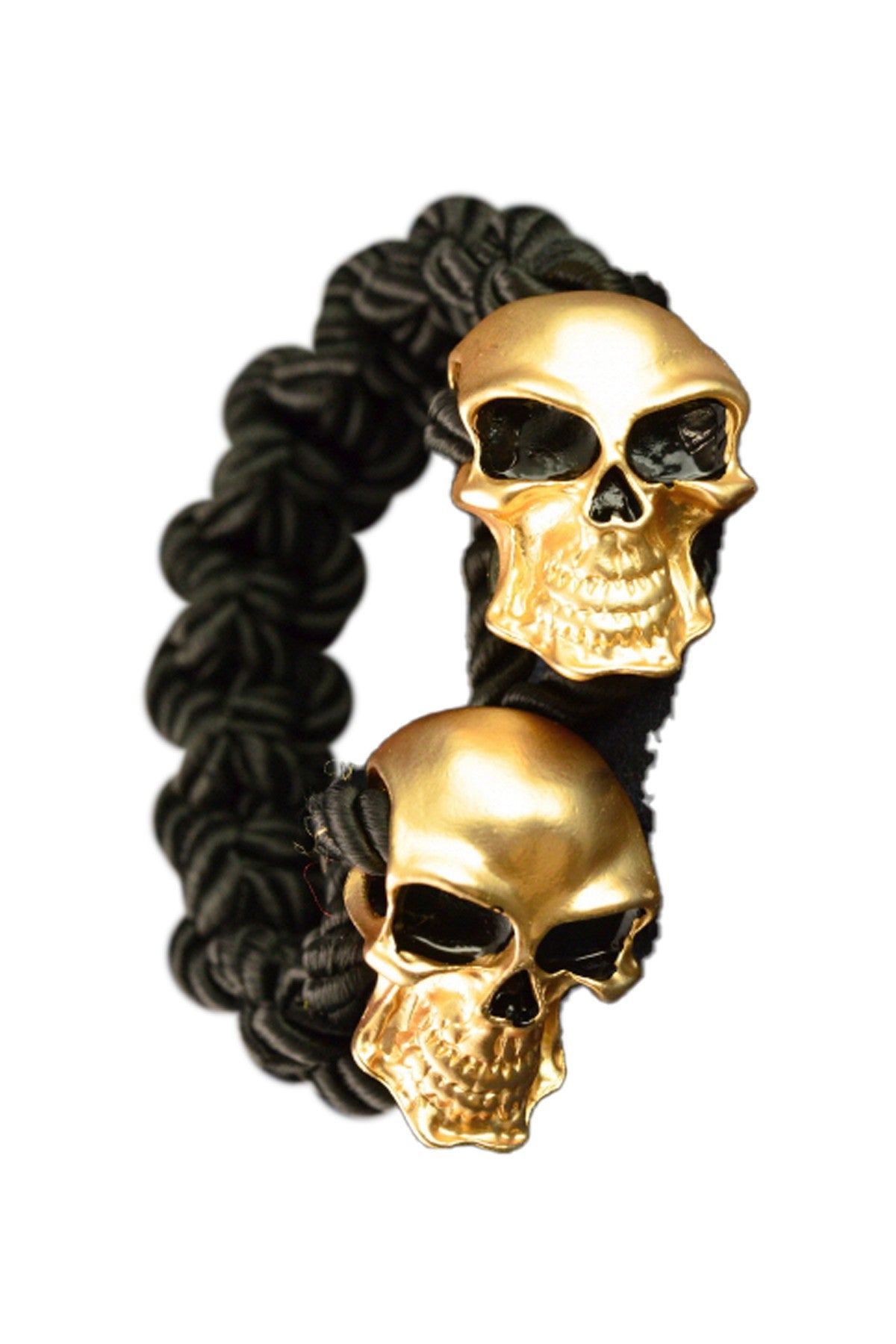 Double SKULL Bracelet featuring gold and silver tone hardware with a toggle clasp, showcasing a unique double skull design.