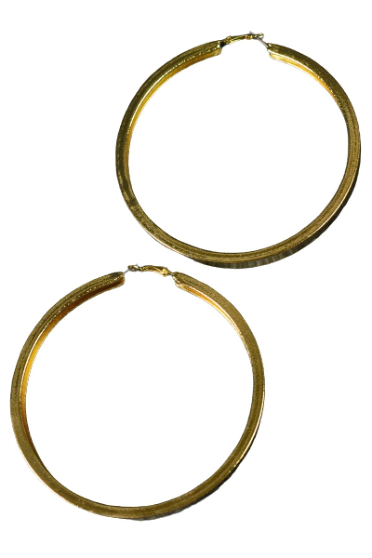 Large textured thick hoop earrings with a lever back closure, showcasing a stylish design suitable for various occasions.