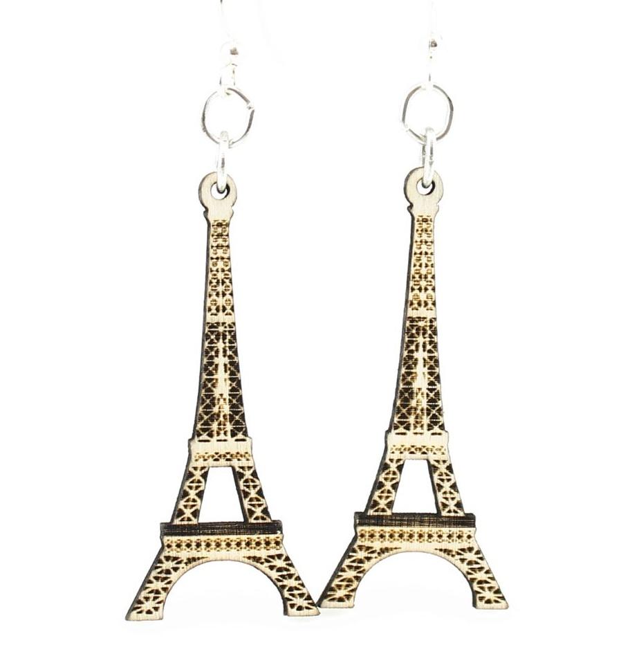 A pair of elegant Eiffel Tower earrings made from sustainably sourced wood, featuring a laser-cut design and silver-finished hypoallergenic ear wires.