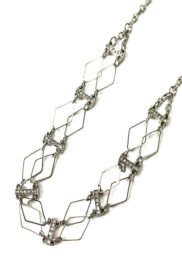 Elegant Diamond Cutout Crystal Accent Choker featuring a diamond cutout design and sparkling crystal accents, adjustable length with lobster claw clasp.