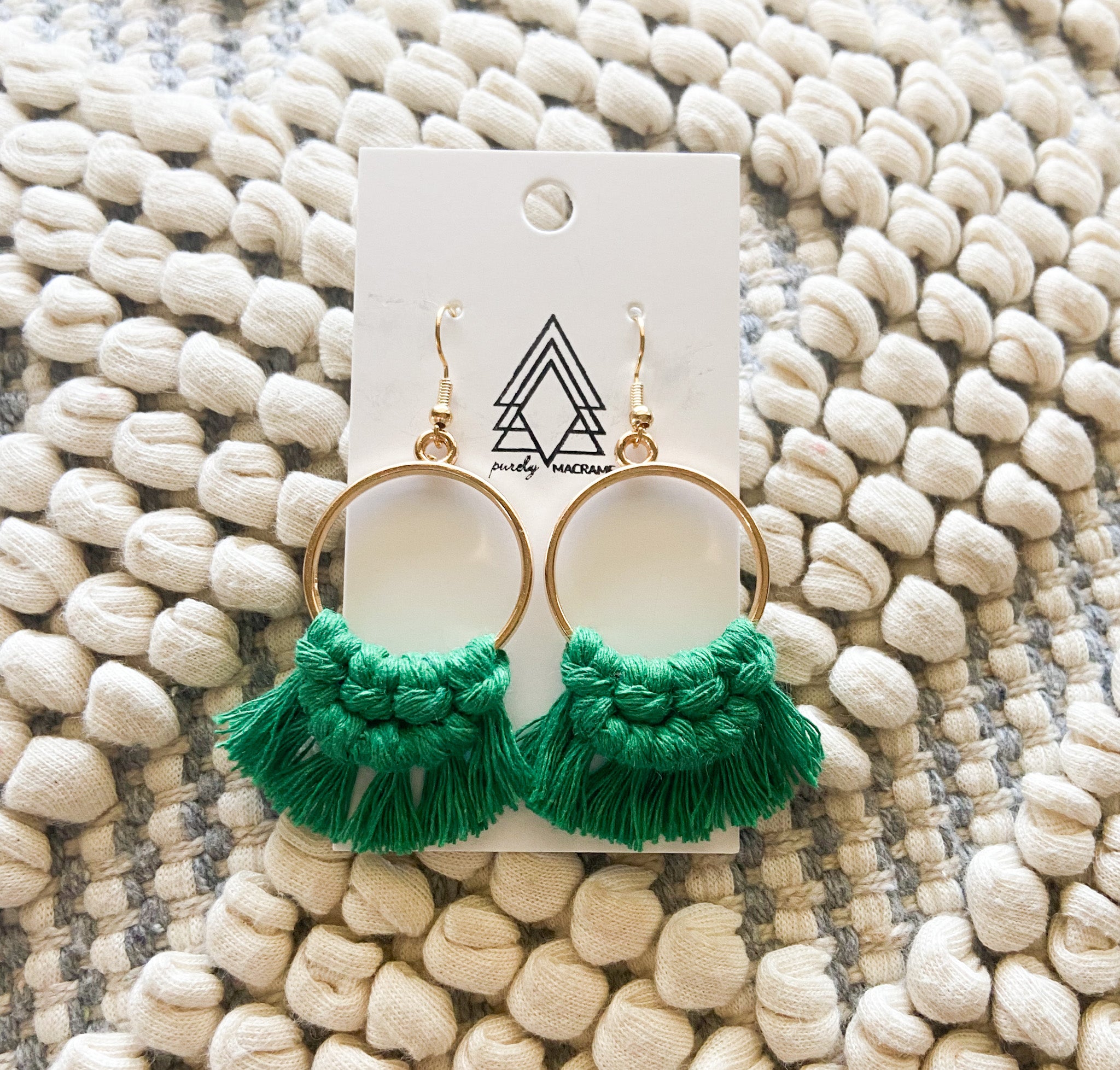 Emerald Rounds earrings made from 100% macrame cord, featuring a vibrant emerald color and lightweight design.