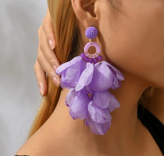 A pair of stylish Flower Glam Earrings featuring vibrant beaded lace flowers, perfect for accessorizing any outfit.